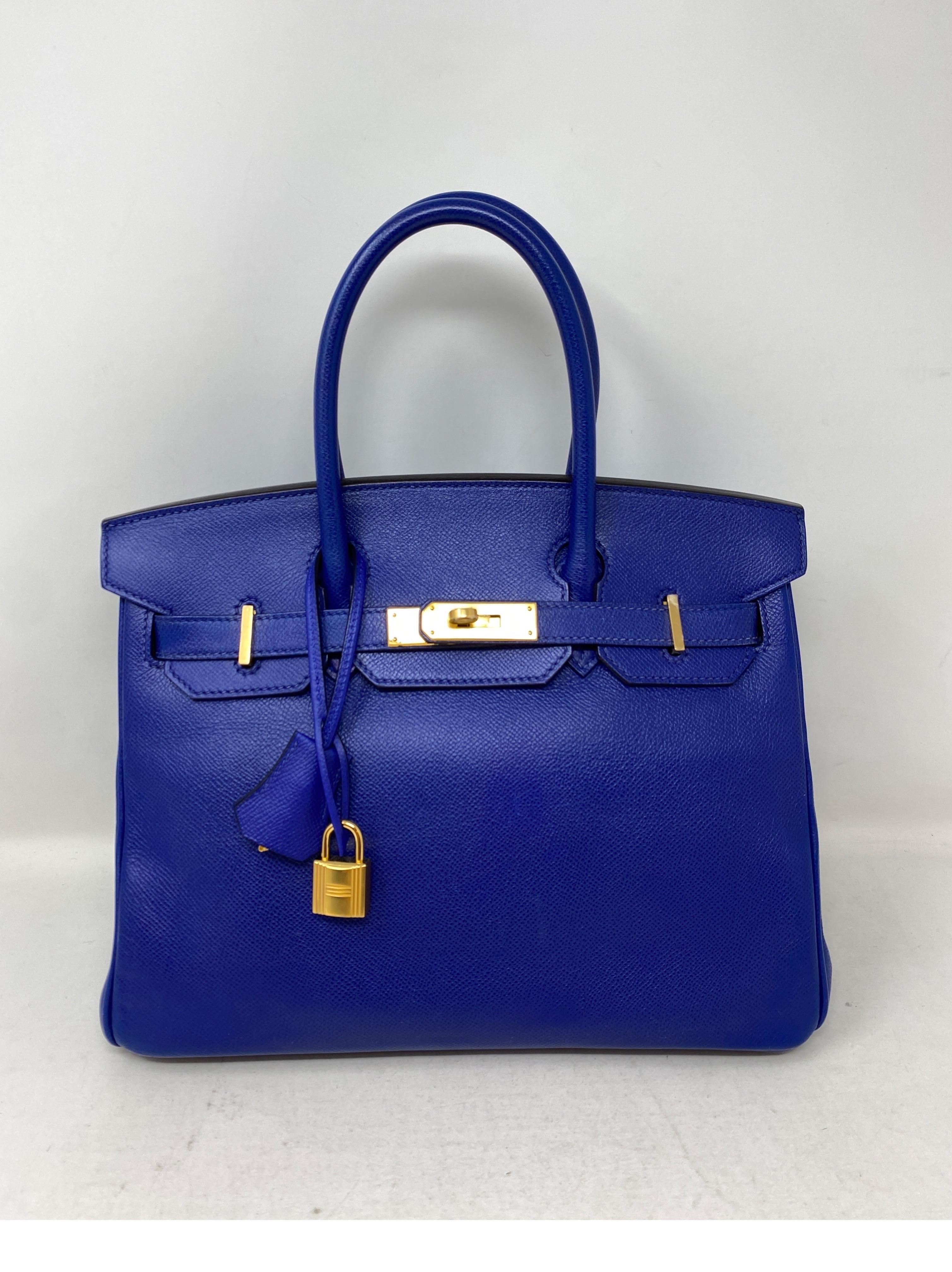 Hermes Bleu Electrique Birkin 30 Bag. Rare blue color. Highly sought after color and most wanted size 30. Excellent condition. Gold hardware. Epsom leather. Great investment bag. A unique color to add to your Birkin collection. Includes clochette,
