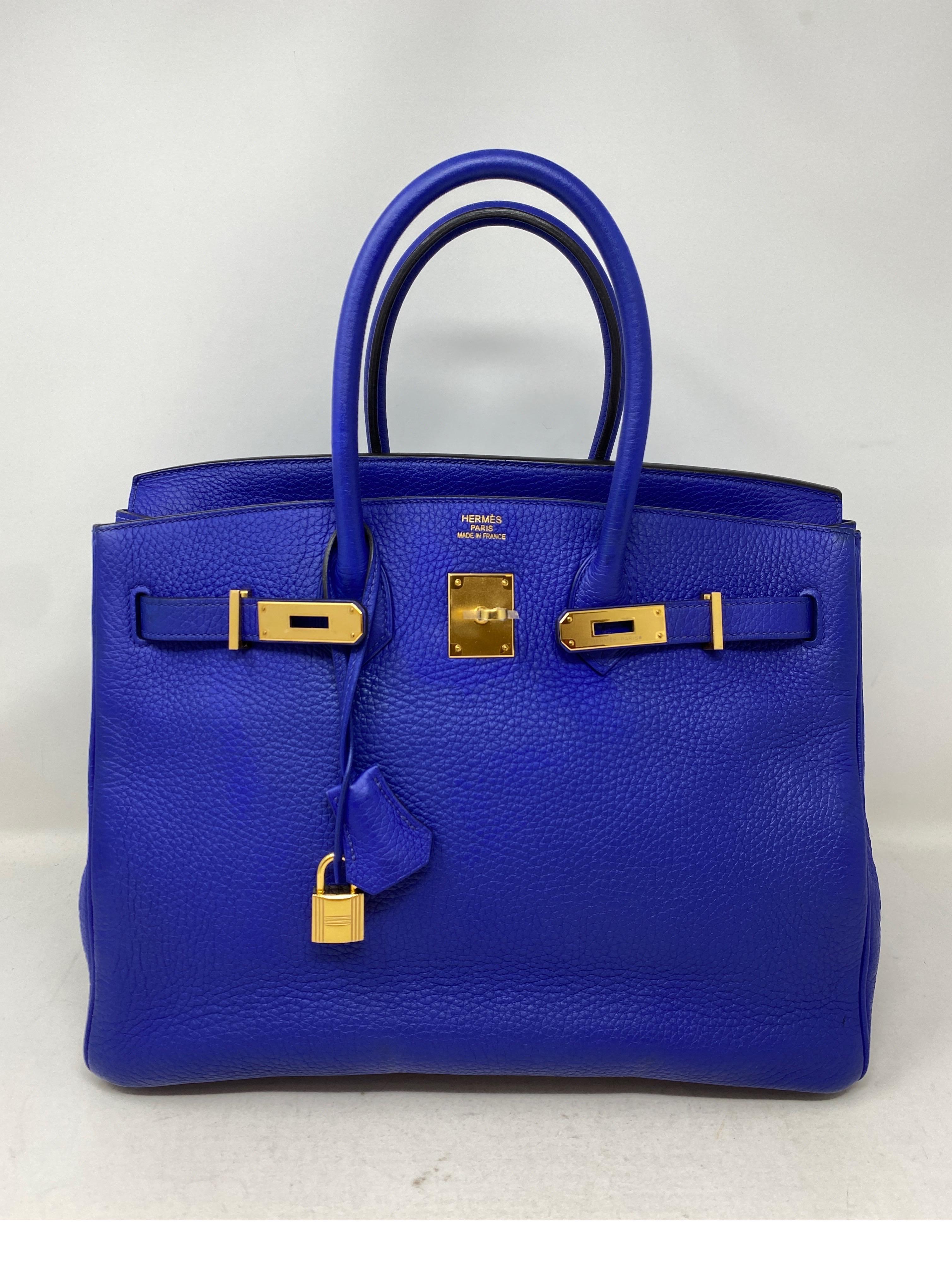 Hermes Bleu Electrique Birkin 35 Bag. Excellent condition. Vibrant electric blue color that stands out. Rare bag with gold hardware. Clemence leather. This one won't last. Sells quickly on the resale market. Great investment bag. Includes clochette,