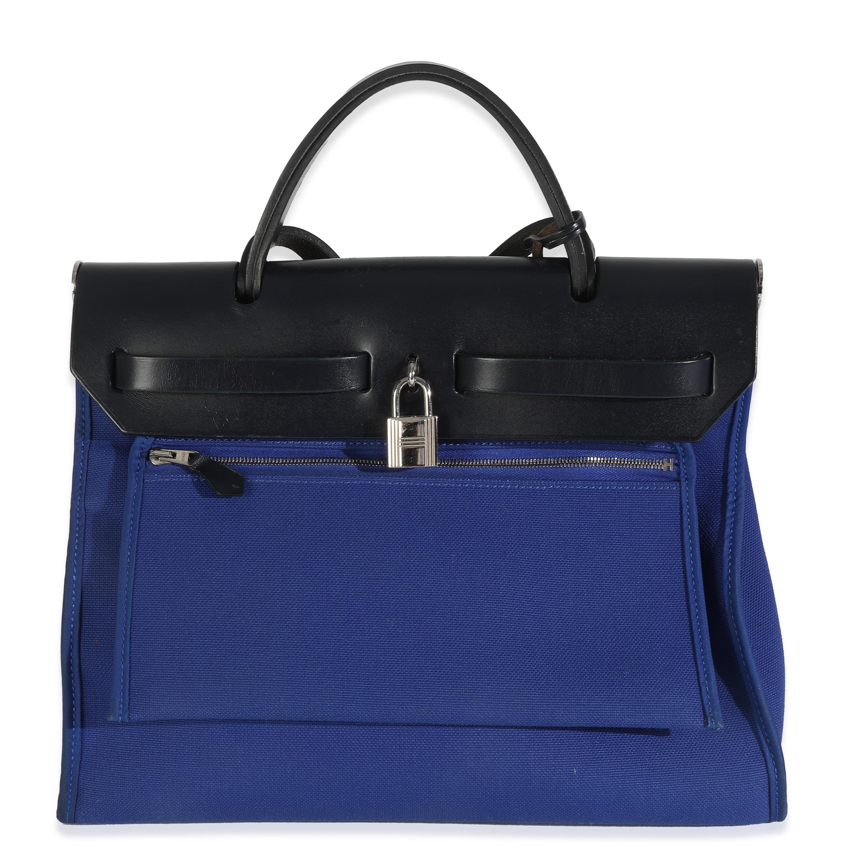 Listing Title : Hermès Bleu Electrique Bleu Saphir Militaire Vache Hunter Herbag Zip 31 PHW
SKU : Z147977
Condit : Usagé 
Condition du sac à main : Très bon
Commentaires sur l'état : L'article est en très bon état avec des signes mineurs d'usure.