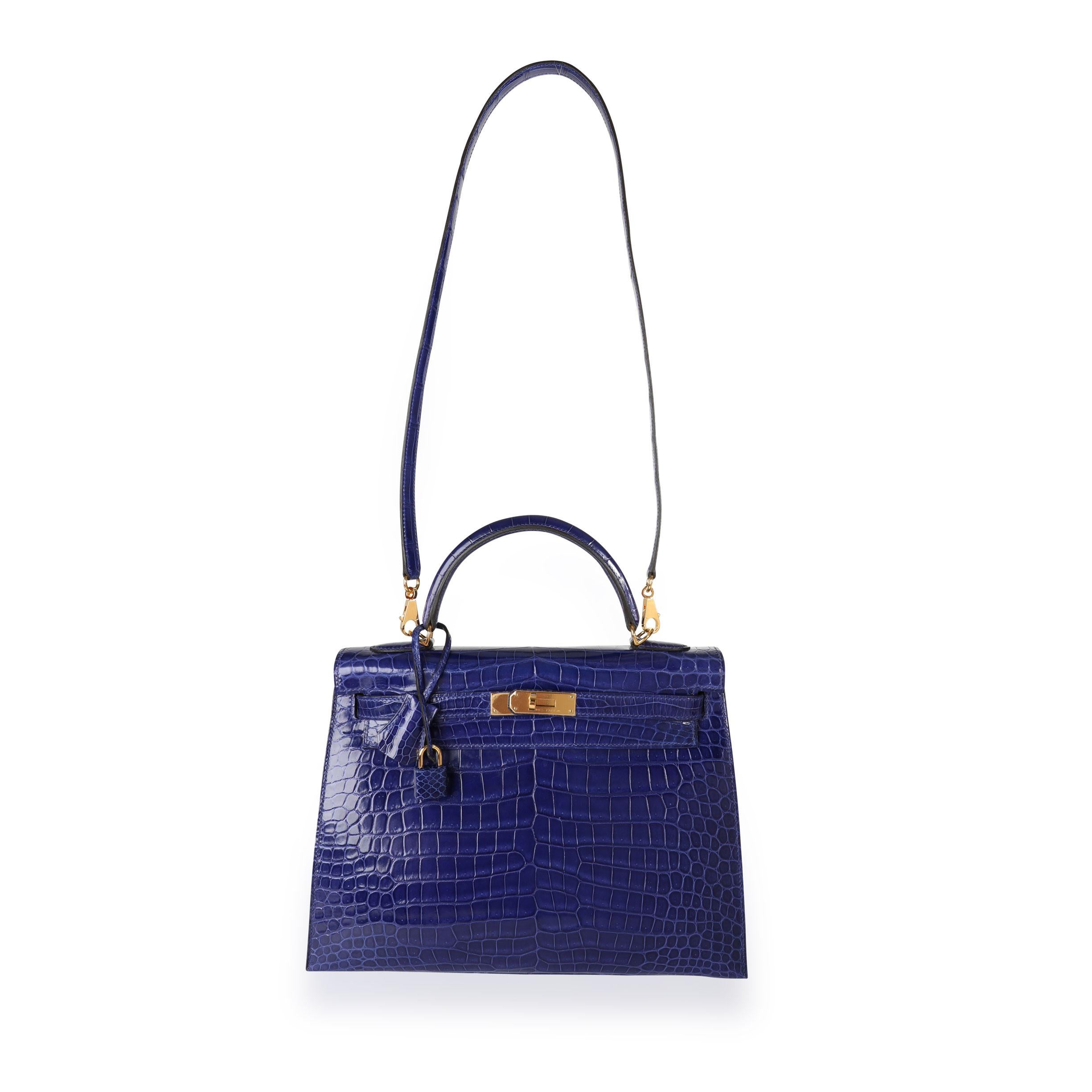 Hermès Bleu Électrique Shiny Porosus Crocodile Sellier Kelly 32 GHW
SKU: 110781

Handbag Condition: Very Good
Condition Comments: Very Good Condition. Plastic on most hardware. Light marks to skin. Please note: this item can not be shipped to all