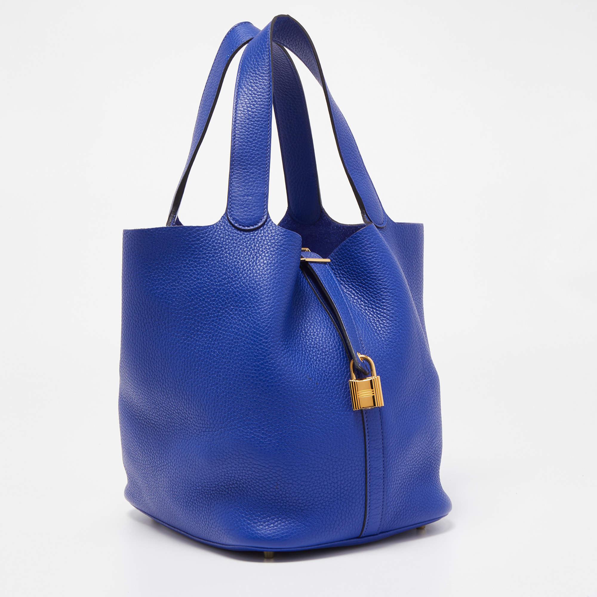 Wonderfully crafted using Clemence leather, this Picotin bag from Hermes is a creation for people who love a perfect blend of luxury and style. Armed with protective metal feet as a finishing touch, this bag is ideal for everyday usage.


