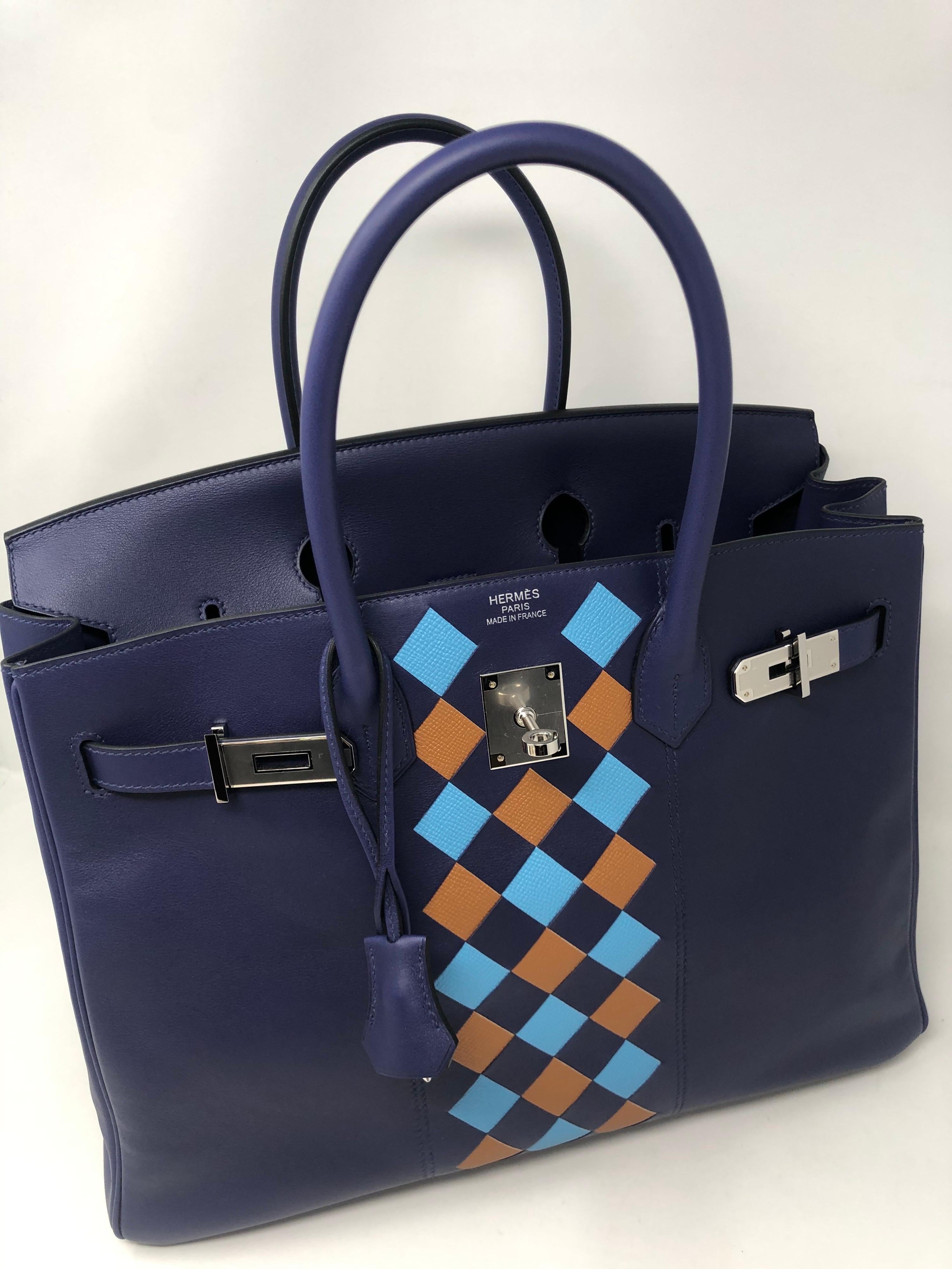 Hermes Bleu Encre Tressage De Cuir Birkin 35. Palladium hardware. Birkin is in Bleu Encre Swift leather and has Bleu De Nord and Gold Epsom leather Tressage design in front. Rare bag and limited. This bag has never been used. Brand new. Stayed in