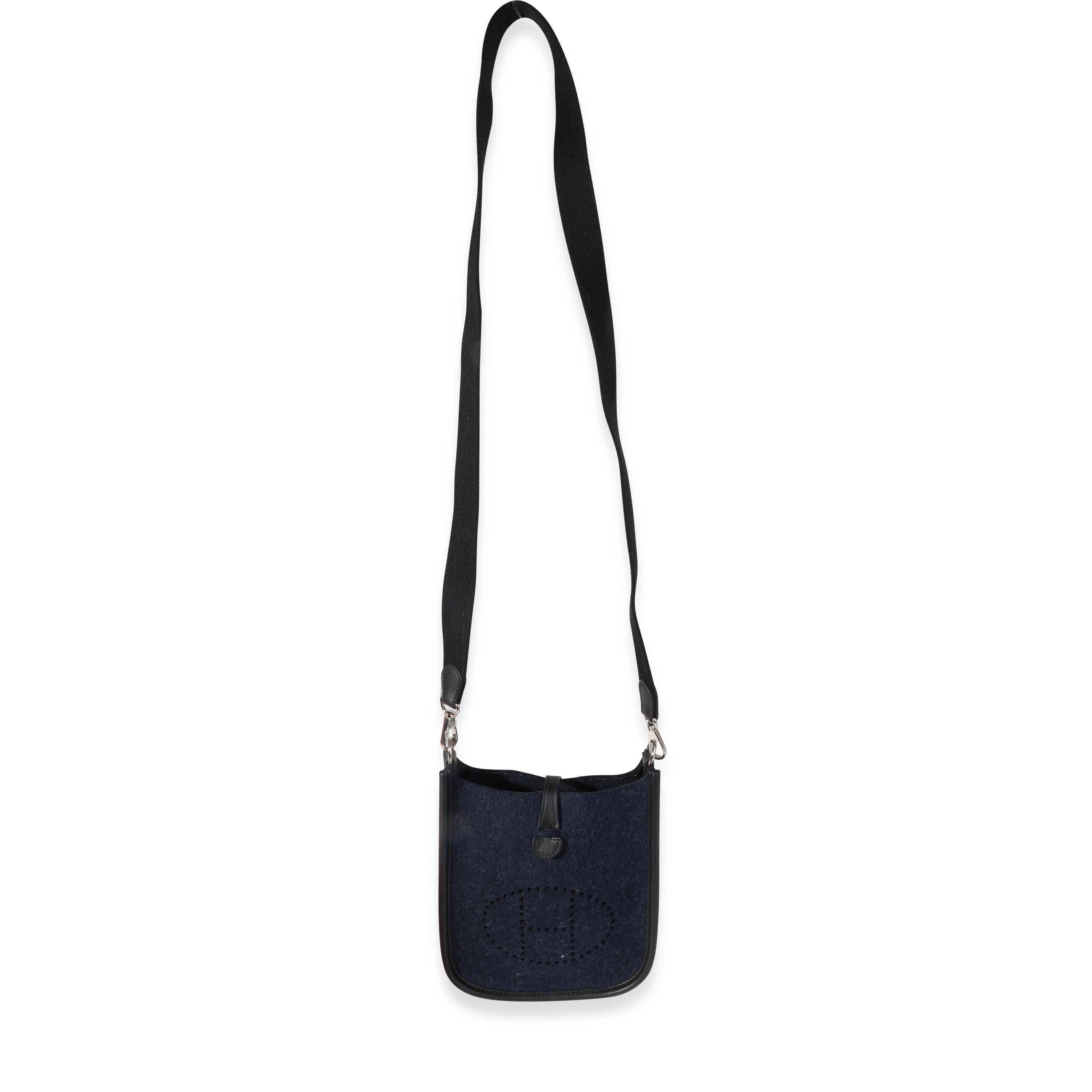 Listing Title: Hermès Bleu Nuit Feutre & Black Swift Evelyne TPM PHW
SKU: 119828
Condition: Pre-owned (3000)
Handbag Condition: Excellent
Condition Comments: Excellent Condition. Light pilling to wool. No other visible signs of wear.
Brand: