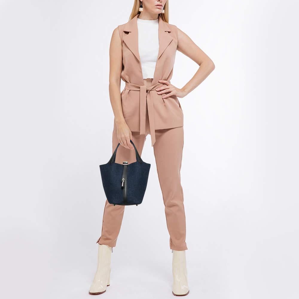 Erleben Sie Luxus mit dieser authentischen Hermes Picotin Lock 18 Tasche. Sorgfältig hergestellt aus den besten MATERIALEN  Es ist ein zeitloses Stück, das jedes Outfit aufwertet.