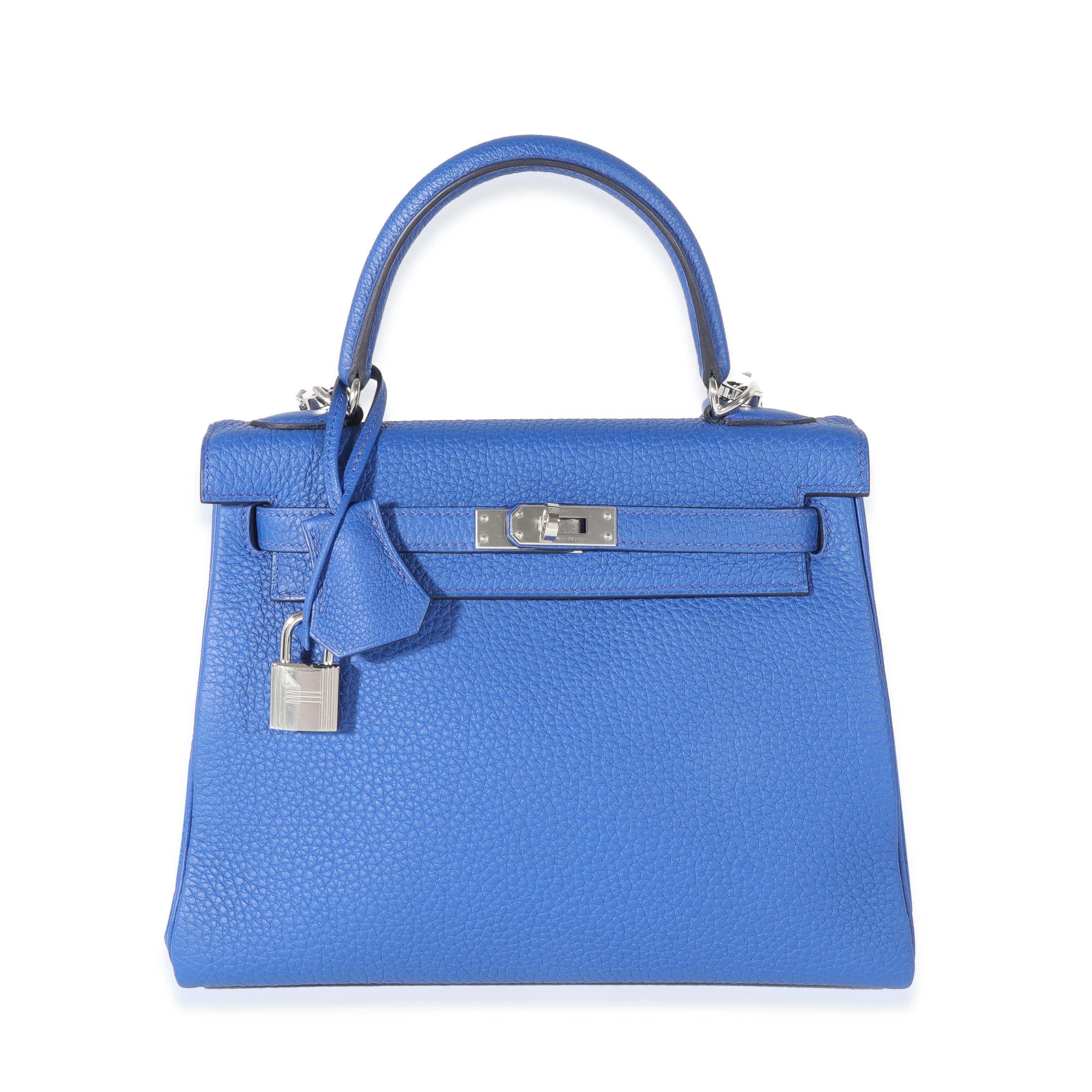 Listing Title: Hermes Bleu Royal Togo Kelly Retourne 25 PHW
SKU: 131406
Condition: Pre-owned 
Condition Description: Officially renamed in 1977, the Kelly tote bag from Hermès was originally called the Sac à Dépêches (which translates as ‘the
