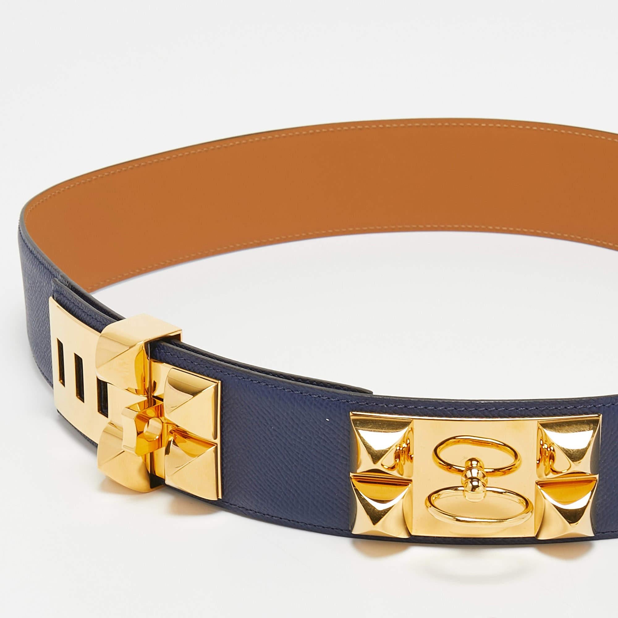 The Hermes Collier De Chien belt is a luxurious and iconic accessory. Made from high-quality Epsom leather, it features the distinctive Collier De Chien design with pyramid studs and a large buckle. This stylish belt adds a touch of sophistication