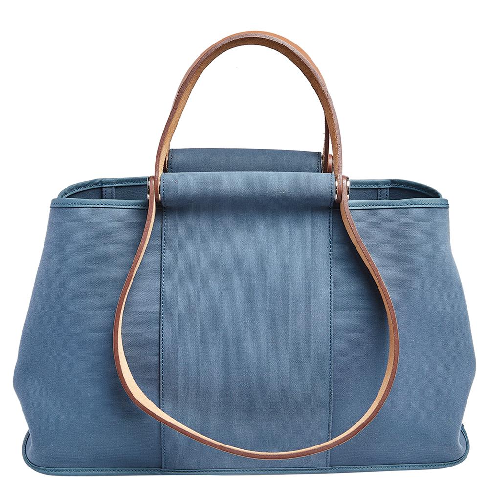 Hermes delivers the highest quality luxury handbags for women and men, making each design a luxury worth buying. The Cabag is crafted from the canvas into a relaxed shape. It has durable leather handles, two of which are shorter than the others. The