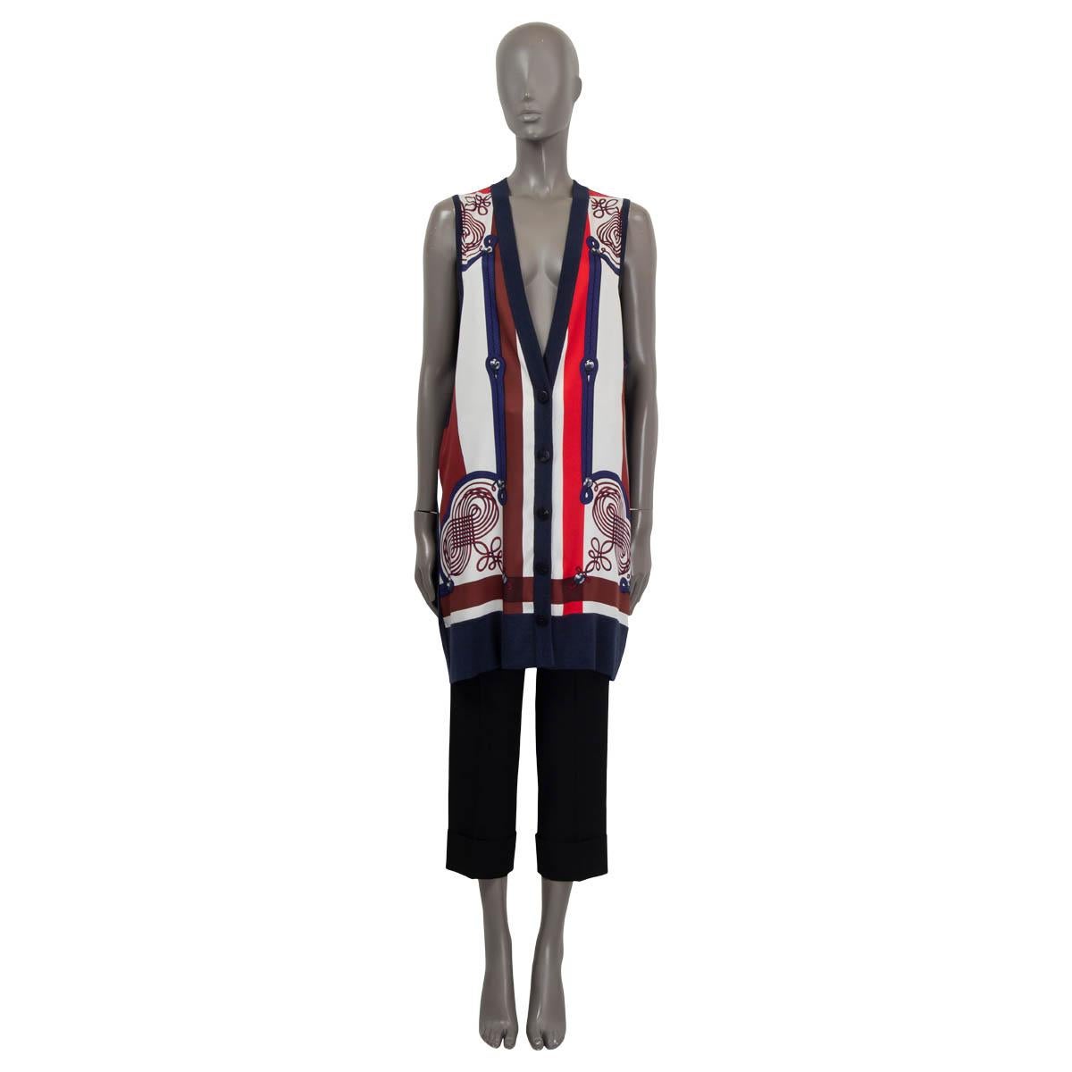100% authentic Hermès Resort 2019 Brandebourgs Encoder oversized long vest in off-white, red, brown and blue silk (100%) with knit parts in navy cashmere (50%) and silk (50%). Opens with navy Hermès buttons on the front. Unlined. Has been worn once