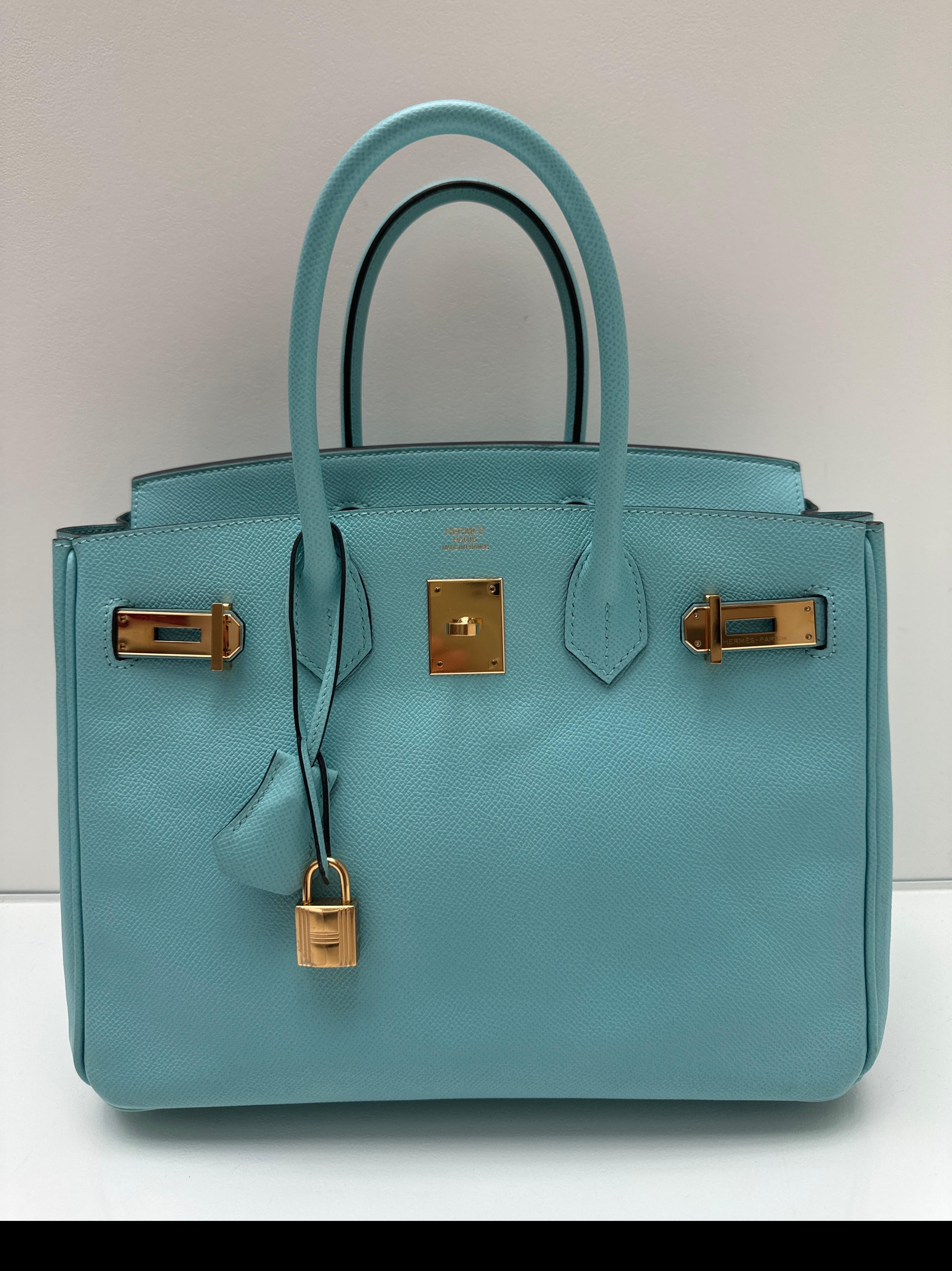 Hermes Blue Atoll Birkin 30 Bag. Excellent condition. Gold hardware. Epsom leather. Light aqua blue color. Interior clean. Includes clochette, lock, keys, and dust bag. Guaranteed authentic. 