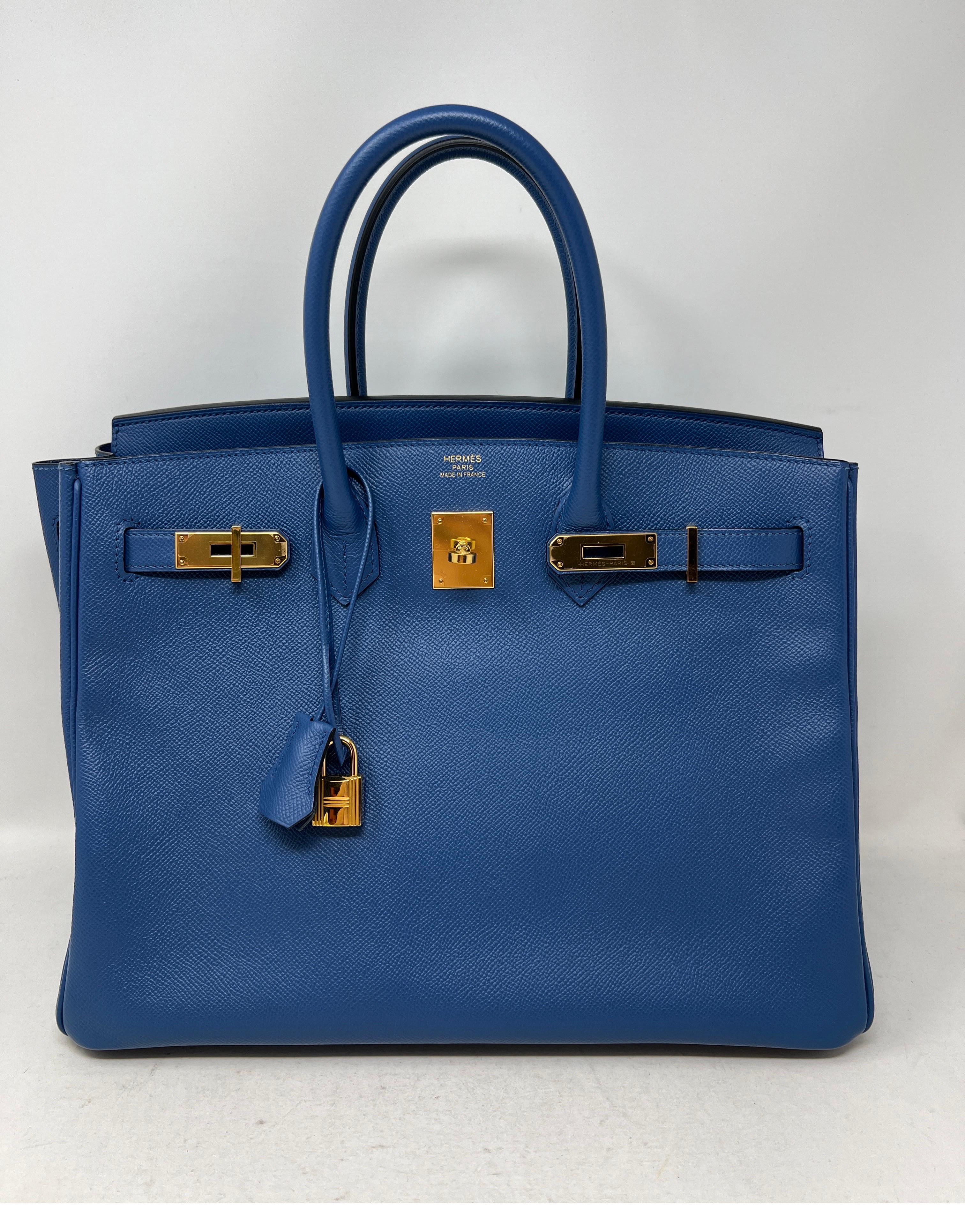 Hermes Blue Birkin 35 Bag. Gold hardware. Epsom leather. Interior is clean. Exterior excellent condition. Looks like it was never used. Newer bag. Includes clochette, lock, keys, and dust bag. Guaranteed authentic. 