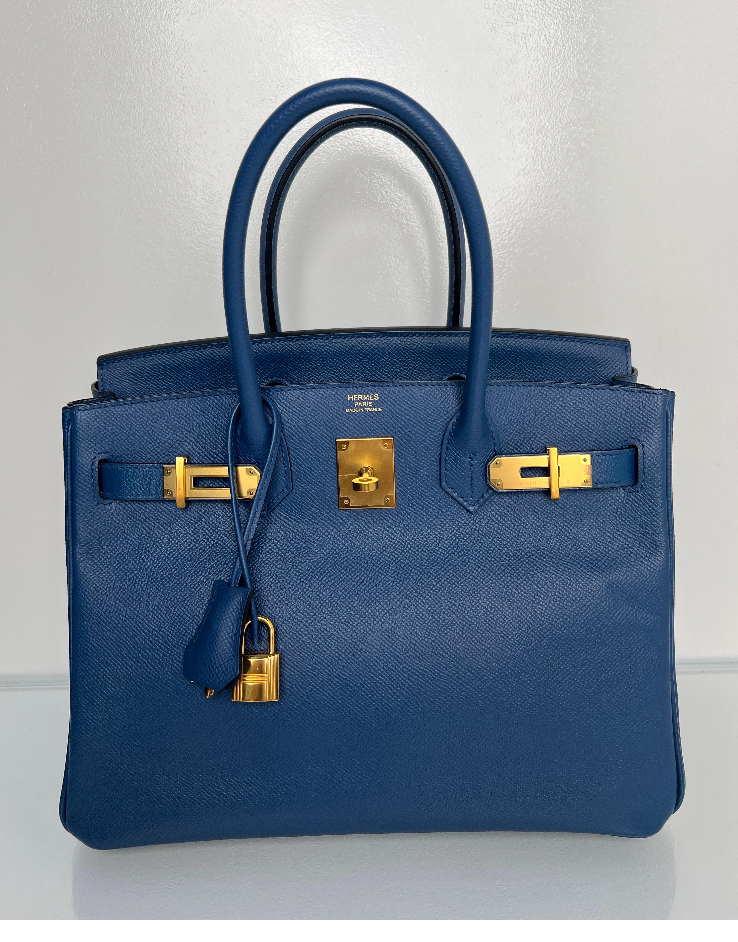 Hermes Blue Brighton Birkin 30 Bag. Rare blue color with gold hardware. Epsom leather. Interior clean. Plastic still on hardware. Interior clean. Newer bag. Includes clochette, lock keys, and dust bag. Guaranteed authentic. 