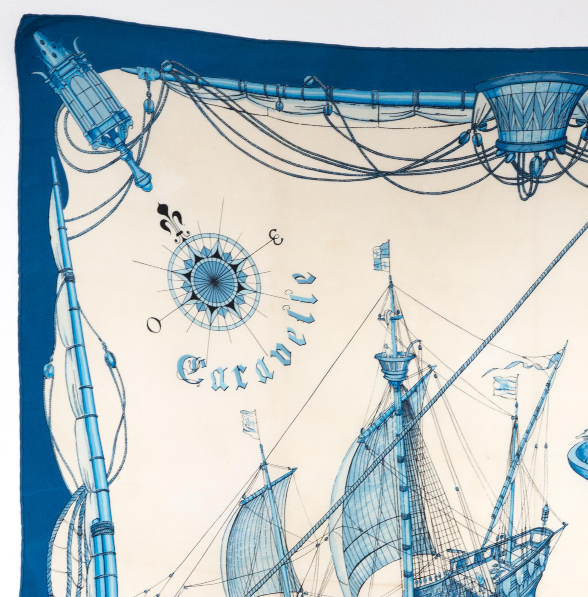 Hermes silk scarf Blue “Caravelle” by Ledoux featuring a light blue border, a boat scene and a top logo signature. 
Circa 1961s 
In good vintage condition. Made in France.
First issue: 1961s
35,4in. (90cm)  X 35,4in. (90cm)
We guarantee you will