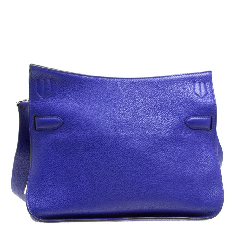 Hermes Jypsiere is a re-interpretation of the iconic Hermes Kelly. The messenger style bag is crafted from Blue Clemence leather. The bag has a round bottom and features a thick adjustable shoulder strap that provides the needed comfort. The front