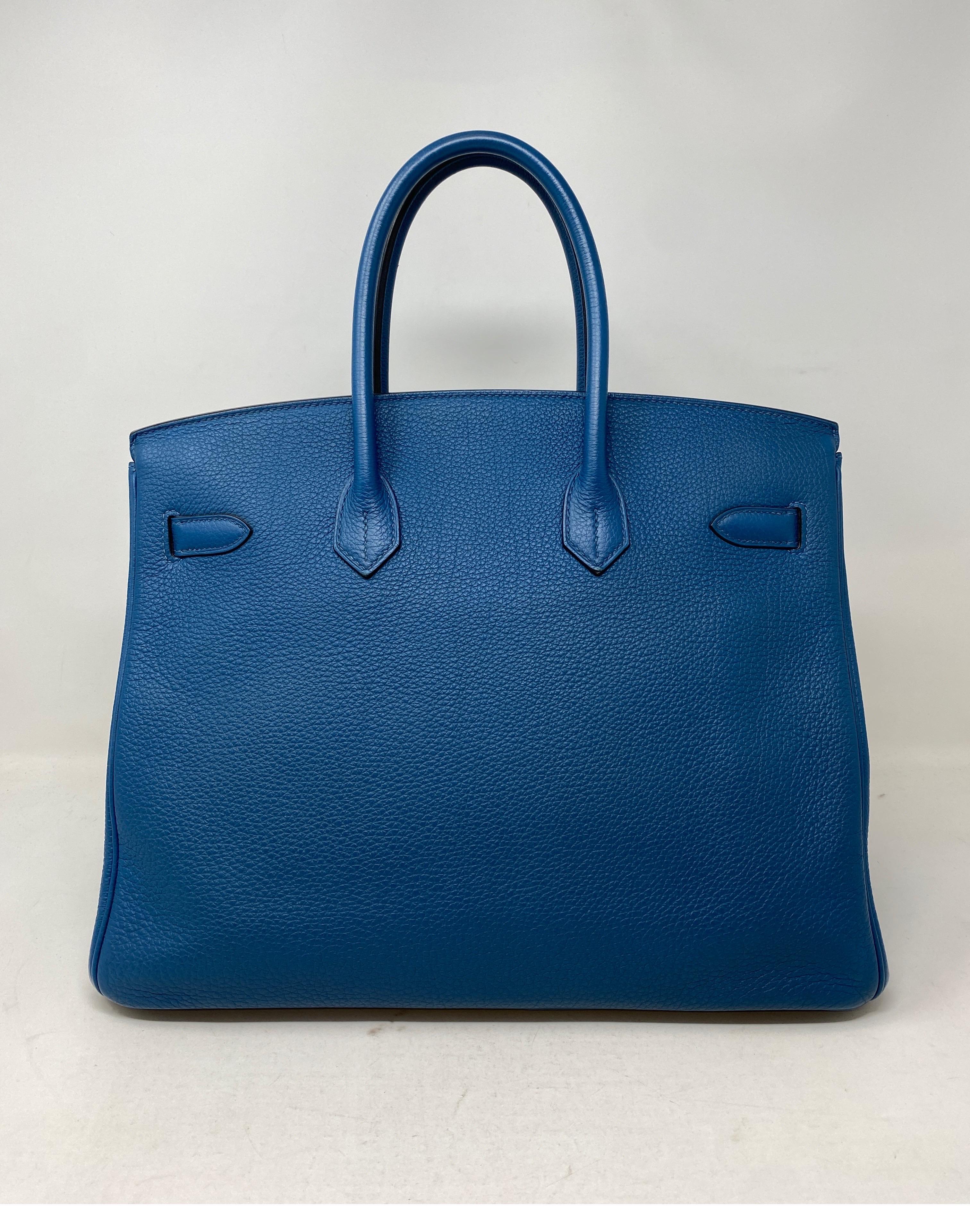 Hermes Blue Covert Birkin Bag. Excellent condtion. Gold hardware. Rare blue color. Size 35 classic size Birkin bag. Includes clochette, lock, keys, and dust cover. Guaranteed authentic. 