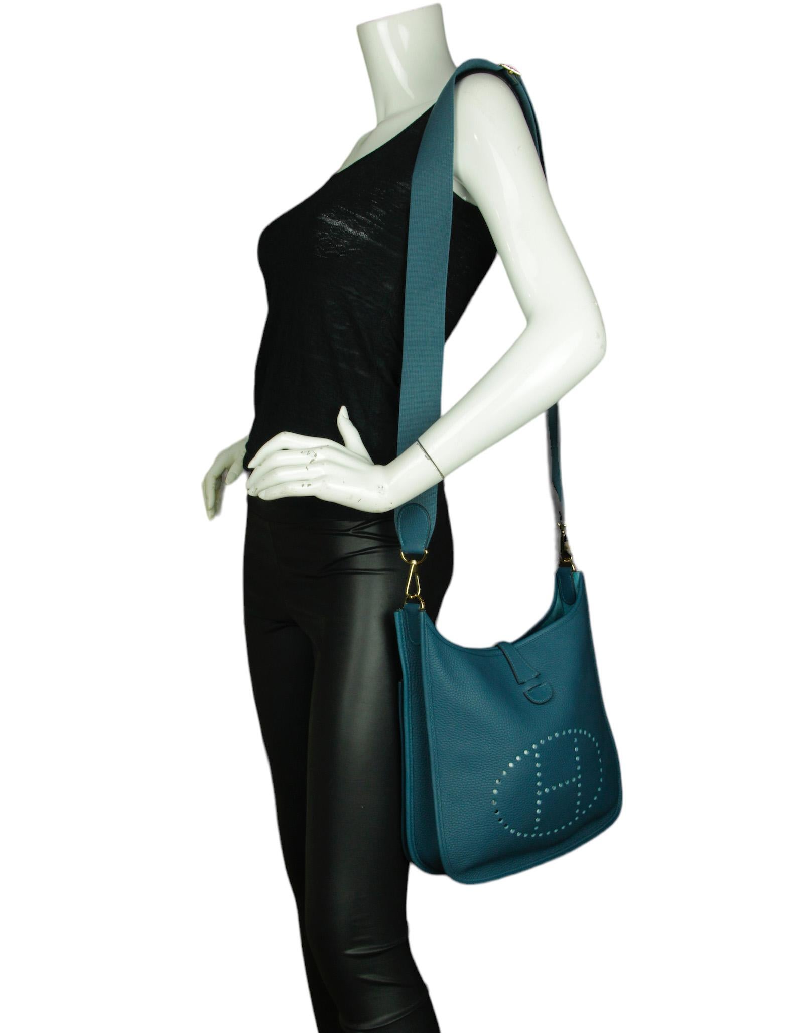 Hermes Blue Colvert Clemence Evelyne III 29 PM Messenger Bag W/ GHW

Made In: France
Year of Production: 2019
Color: Colvert blue
Hardware: Goldtone
Materials: Clemence, metal
Lining: Suede
Closure/Opening: Open top with tab snap closure
Exterior