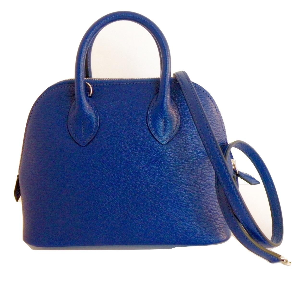 Hermes Mini Bolide Bag
Very Limited Edition
From the Mini Collection of Bags
Collectors go crazy for these because they are so limited
Blue Electric
Chevre Goat Leather
A stamp
Palladium Hardware
Hermes Box, Dustcover, Shoulder strap