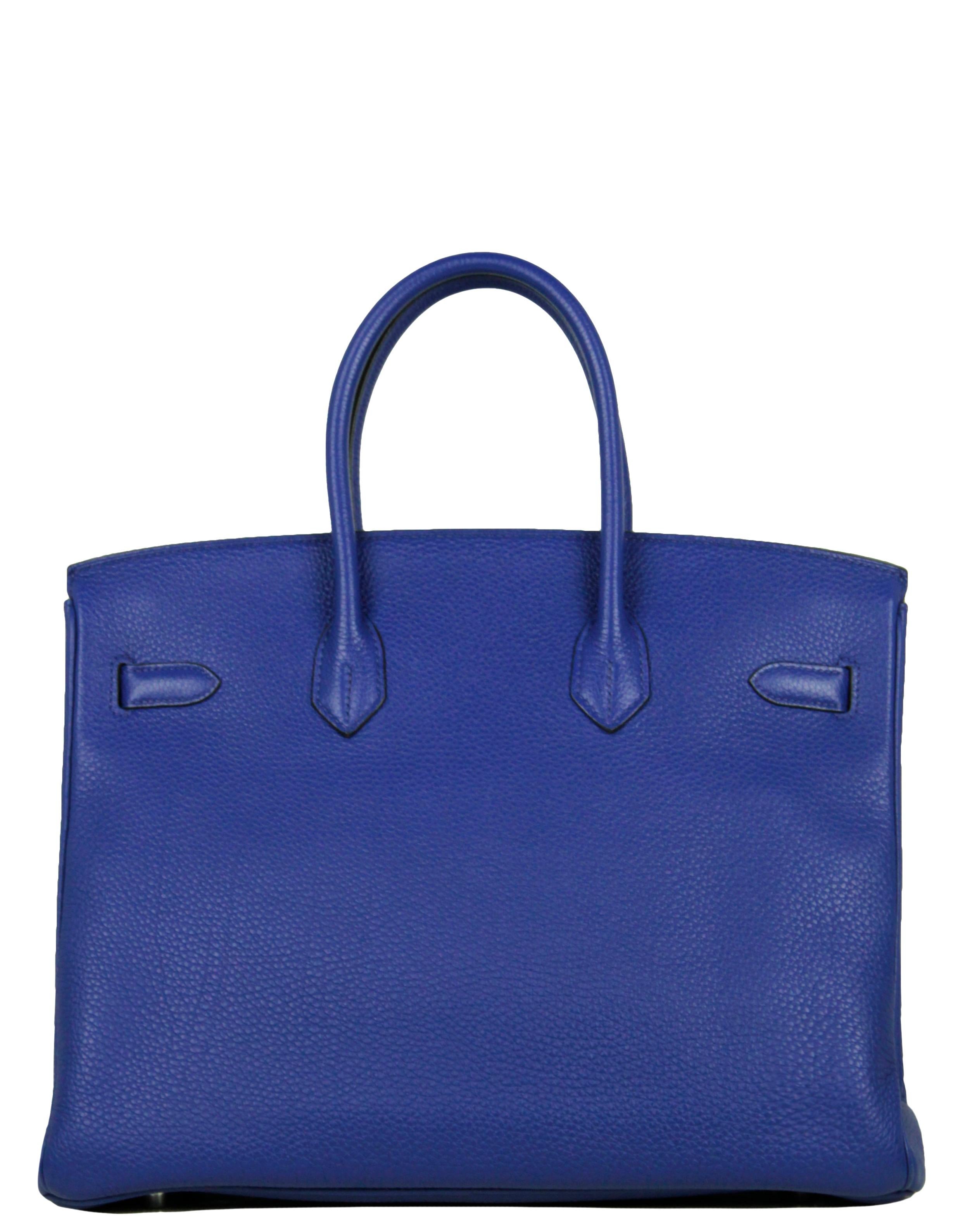 Hermes Blue Electric Togo Leather 35cm Birkin Bag

Made In: France
Year of Production: 2011
Color: Blue electric
Hardware: Silvertone palladium
Materials: Togo leather
Lining: Chevre leather
Closure/Opening: Double arm strap with twist lock
Interior