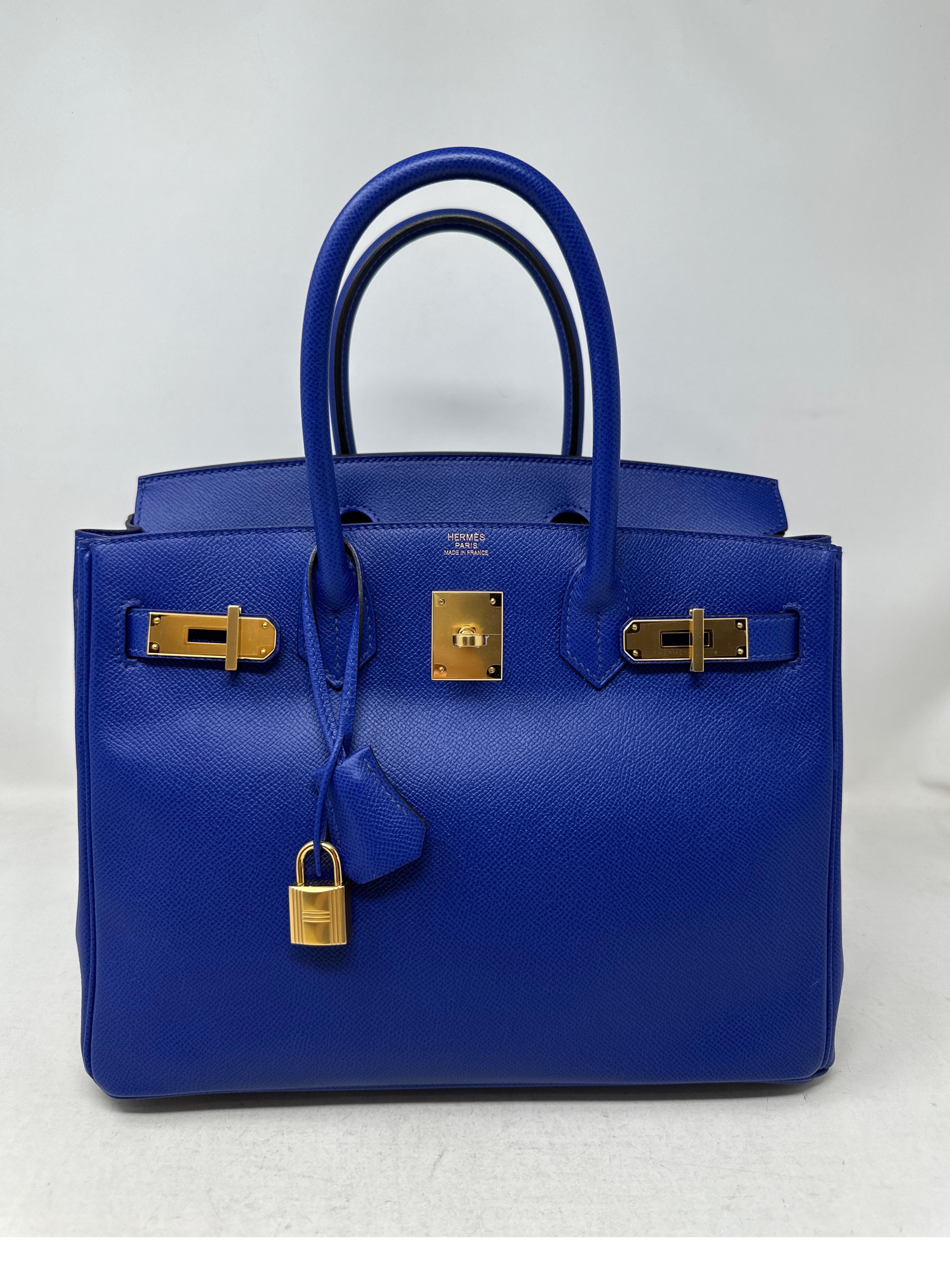 Hermes Blue Electrique Birkin 30 Bag. Excellent condition. Gold hardware. Epsom leather. Interior clean. Exterior looks like new. Rare color blue and vibrant. Hard to find size. Includes clochette, lock, keys, and dust bag. Guaranteed authentic. 