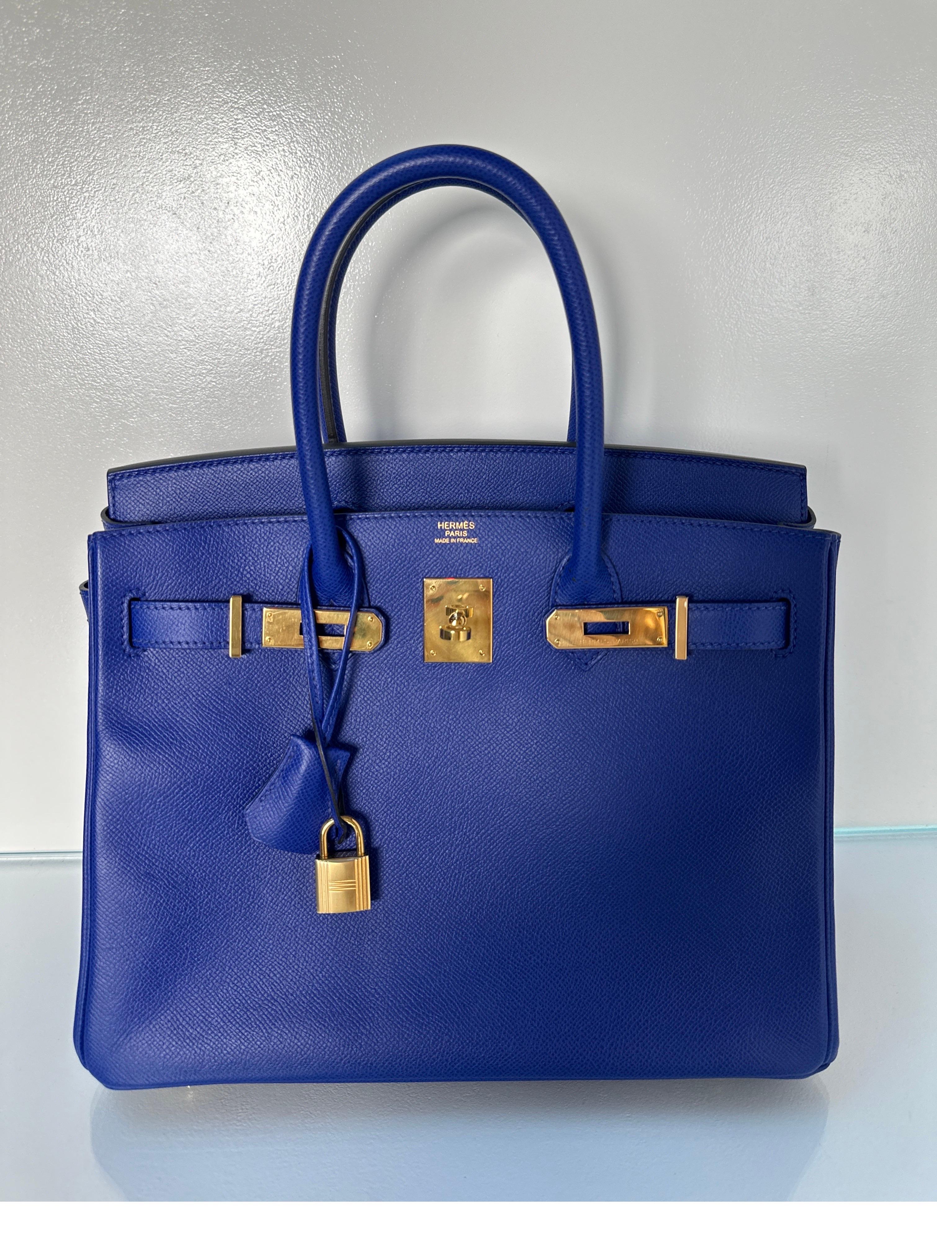 Hermes Blue Electrique Birkin 30 Bag. Epsom leather with gold hardware. Vibrant blue color. Interior clean. This bag is gorgeous. Most wanted size 30. Includes clochette, lock, keys, and dust bag. Guaranteed authentic. 