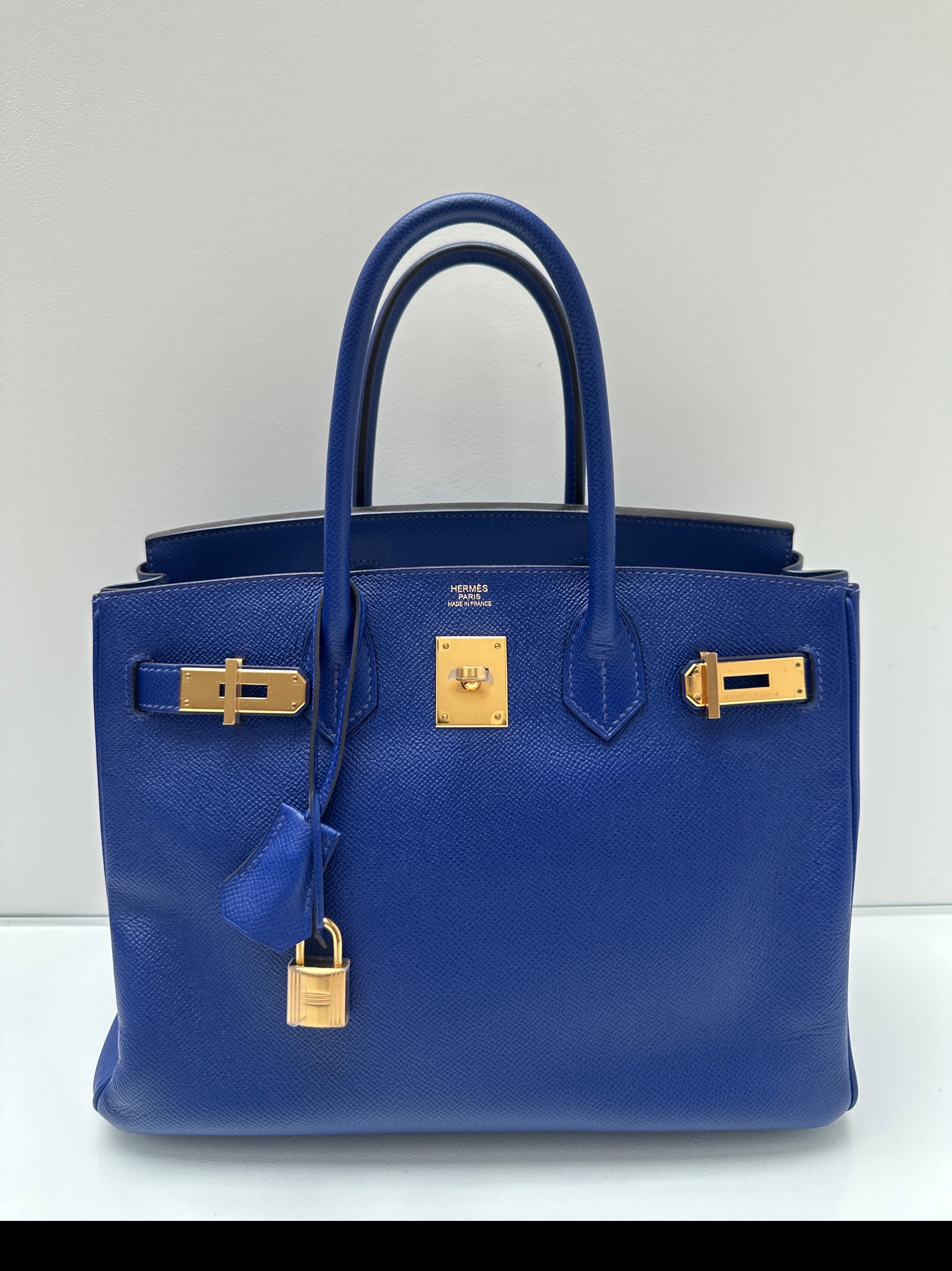 Hermes Blue Electrique Birkin 35 Bag. Excellent condition. Vibrant blue color. Gold hardware. Interior clean. Epsom leather. Includes clochette, lock, keys, and dust bag. Guaranteed authentic. 