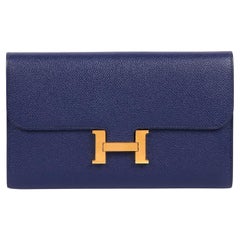 Portafoglio Constance To Go Slim di Hermès in pelle blu Epsom