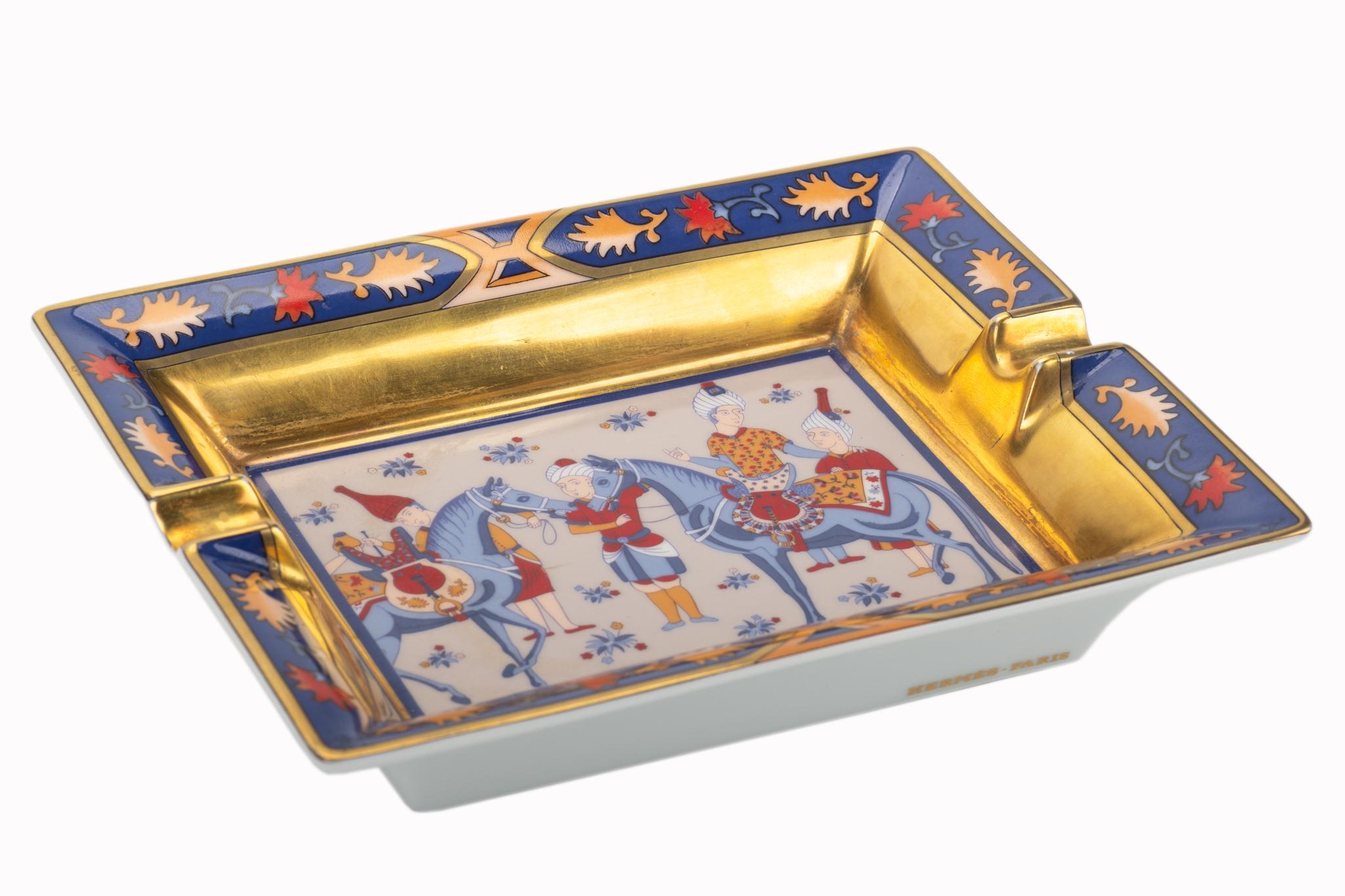 Hermes rare and collectible ashtray with Indian design in blue, red and gold. Suede stamped bottom. Made in France.
