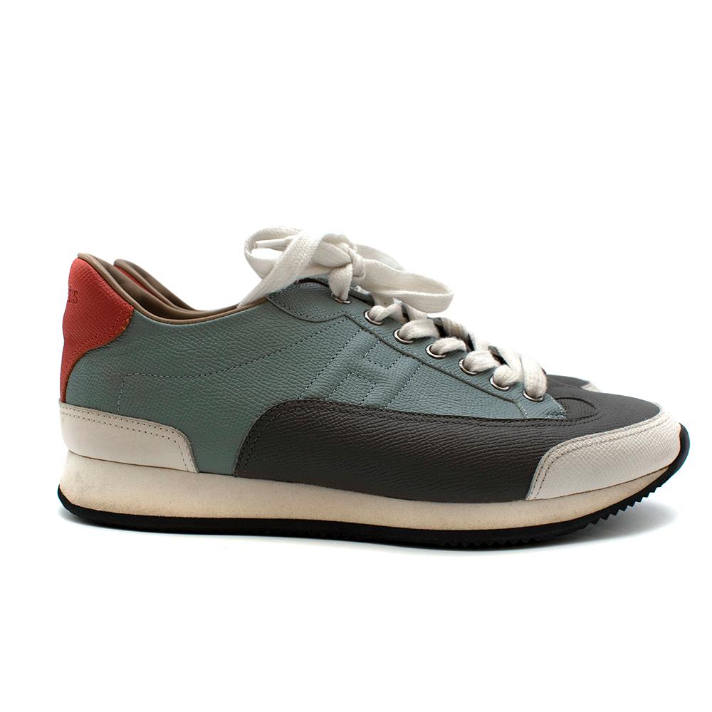 Hermes Blue-Grey Contrast Miles Leather Low-Top Sneakers

- Hermes signature 'Miles' style sneaker
- Braided lace-up front
- Low-top sports inspired design 
- Contrast coloured leather panels 
- Orange Hermes embossed heel tab 
- 'H' Side stitching
