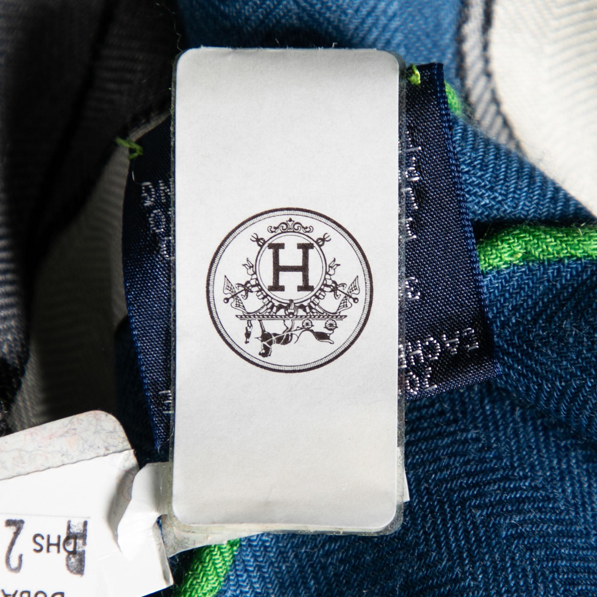 An essential Hermès accessory, the label's scarves are as iconic as any other creation from the brand and are collector's favorites. This rendition is carefully cut from a luxurious silk blend and designed with the Tête-à-Tête Equestre print created