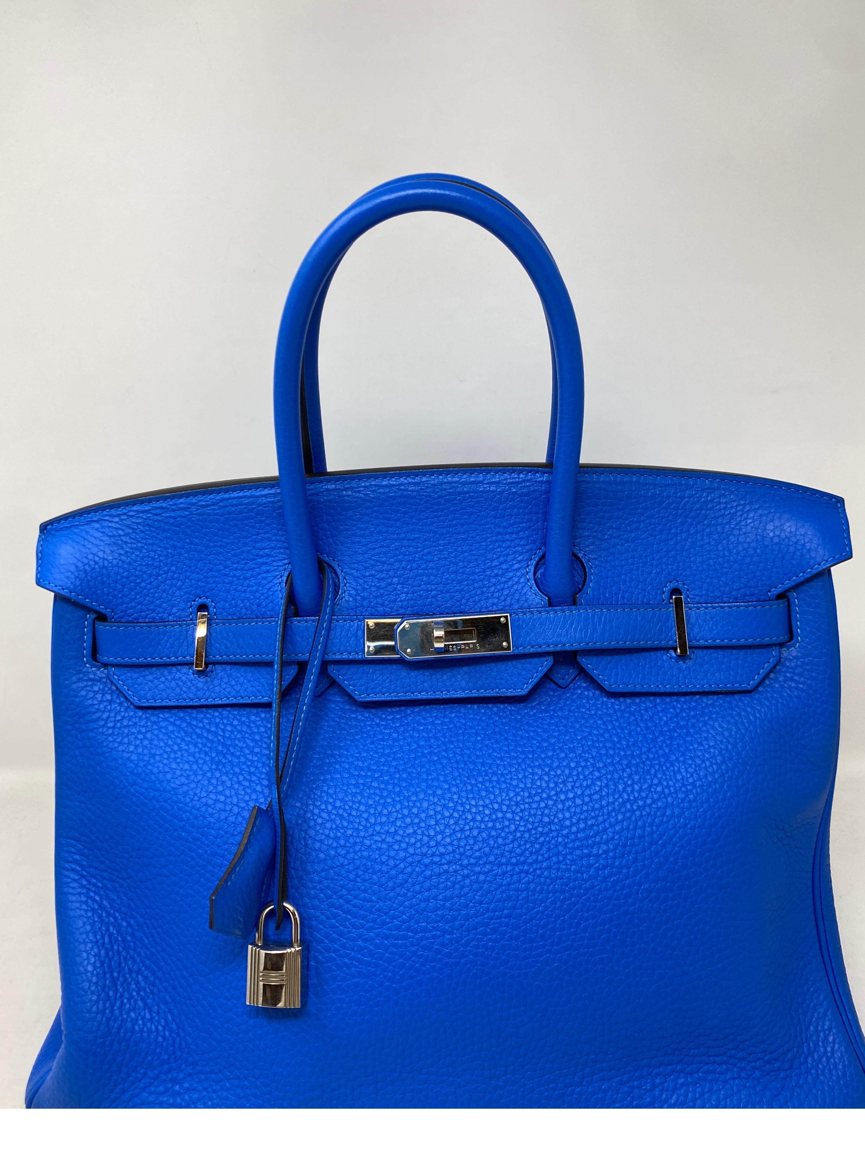 Hermes Blue Hydra Birkin 35 Bag. Bright vibrant blue Birkin. Palladium hardware. Good condition. Interior clean. Priced to sell quick. Includes clochette, lock, keys, and dust bag. Guaranteed authentic. 