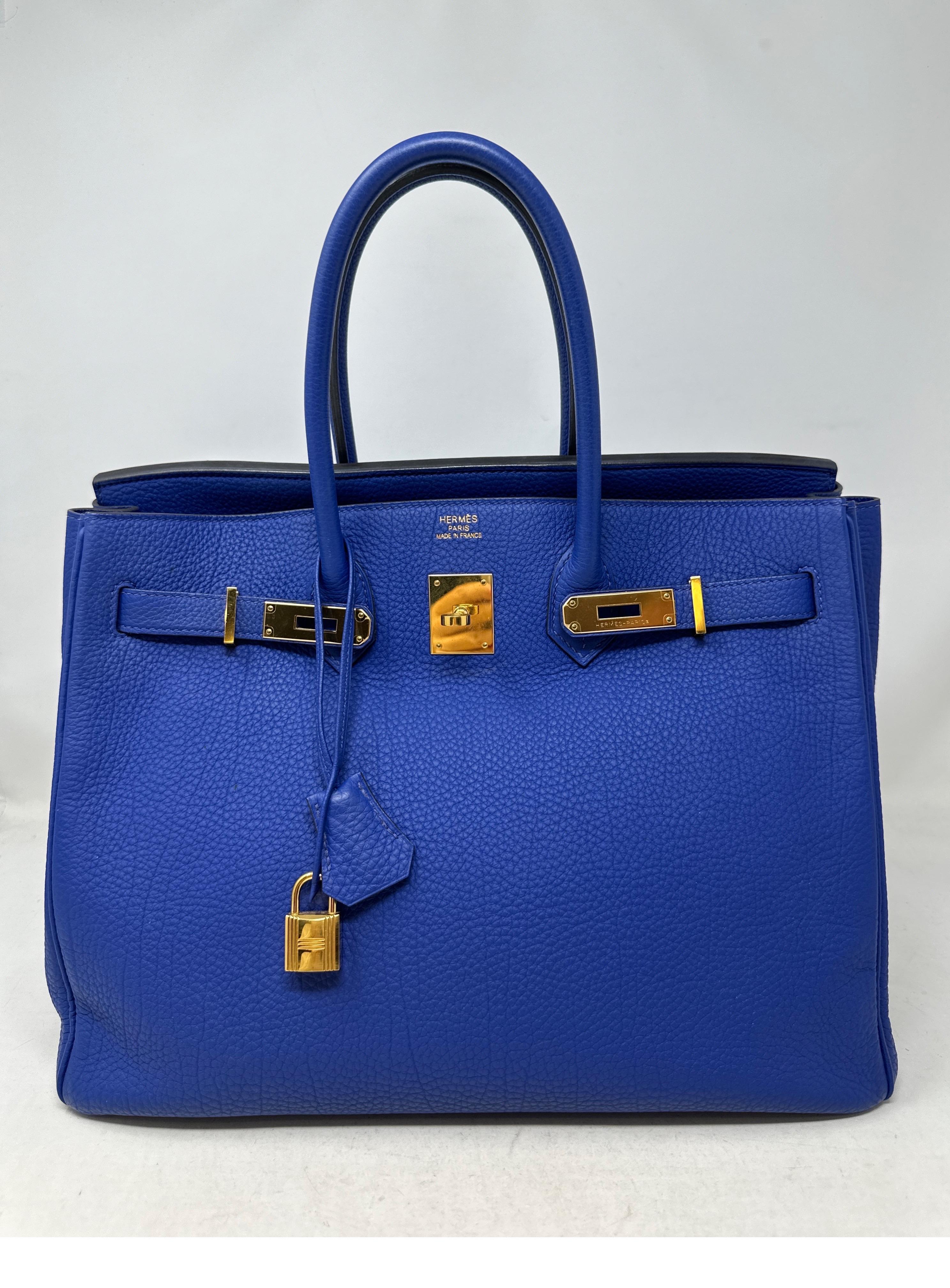 Hermes Blue Hydra Birkin 35 Bag. Rare blue color with gold hardware. Excellent condition. Togo leather. Interior clean. Includes clcohette, lock, keys, and dust bag. Guaranteed authentic. 