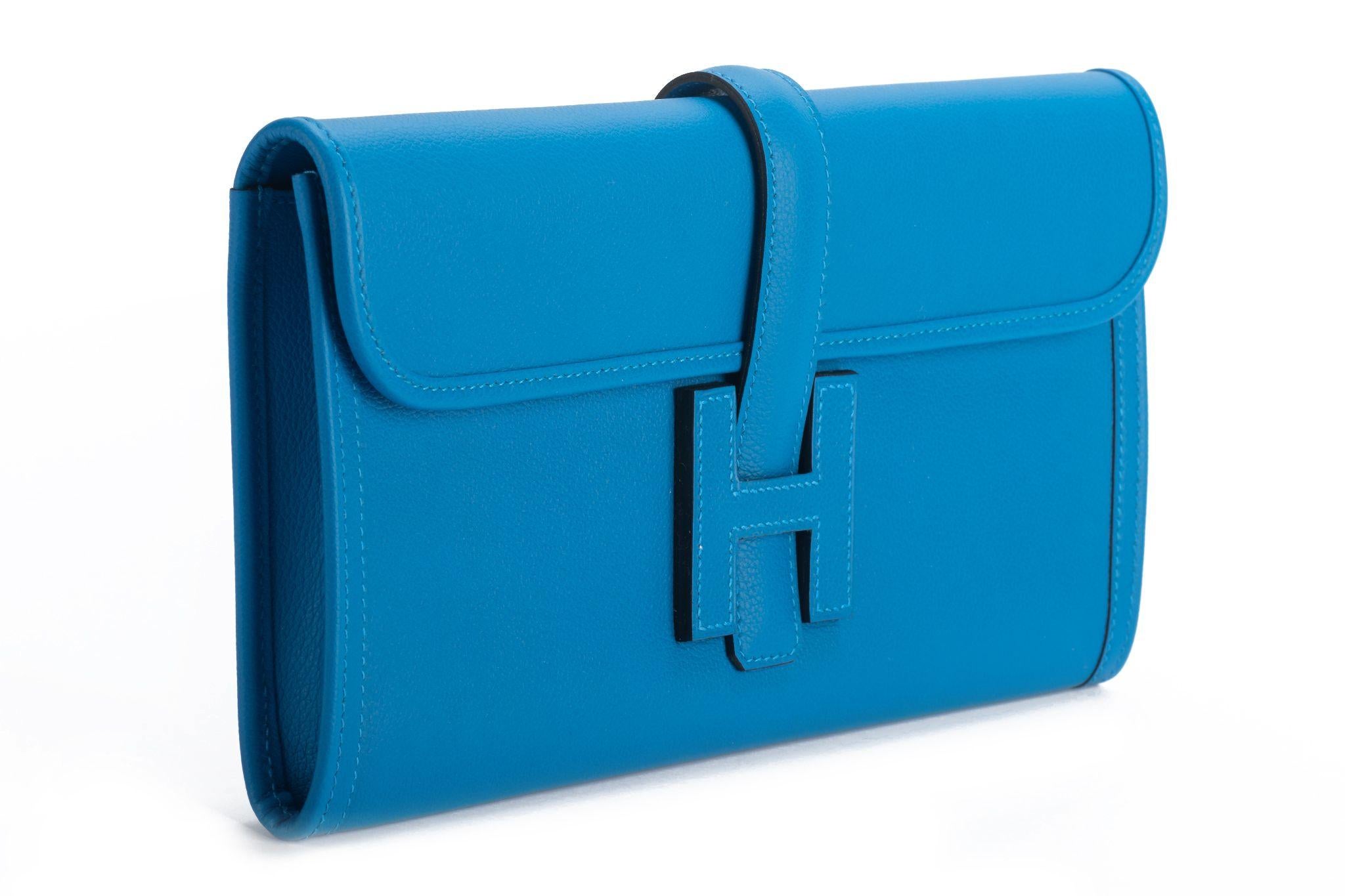 Hermes new blue hydra juge clutch in evercolor leather. Brand new with original dust cover and box. Date stamp Y for 2020.

