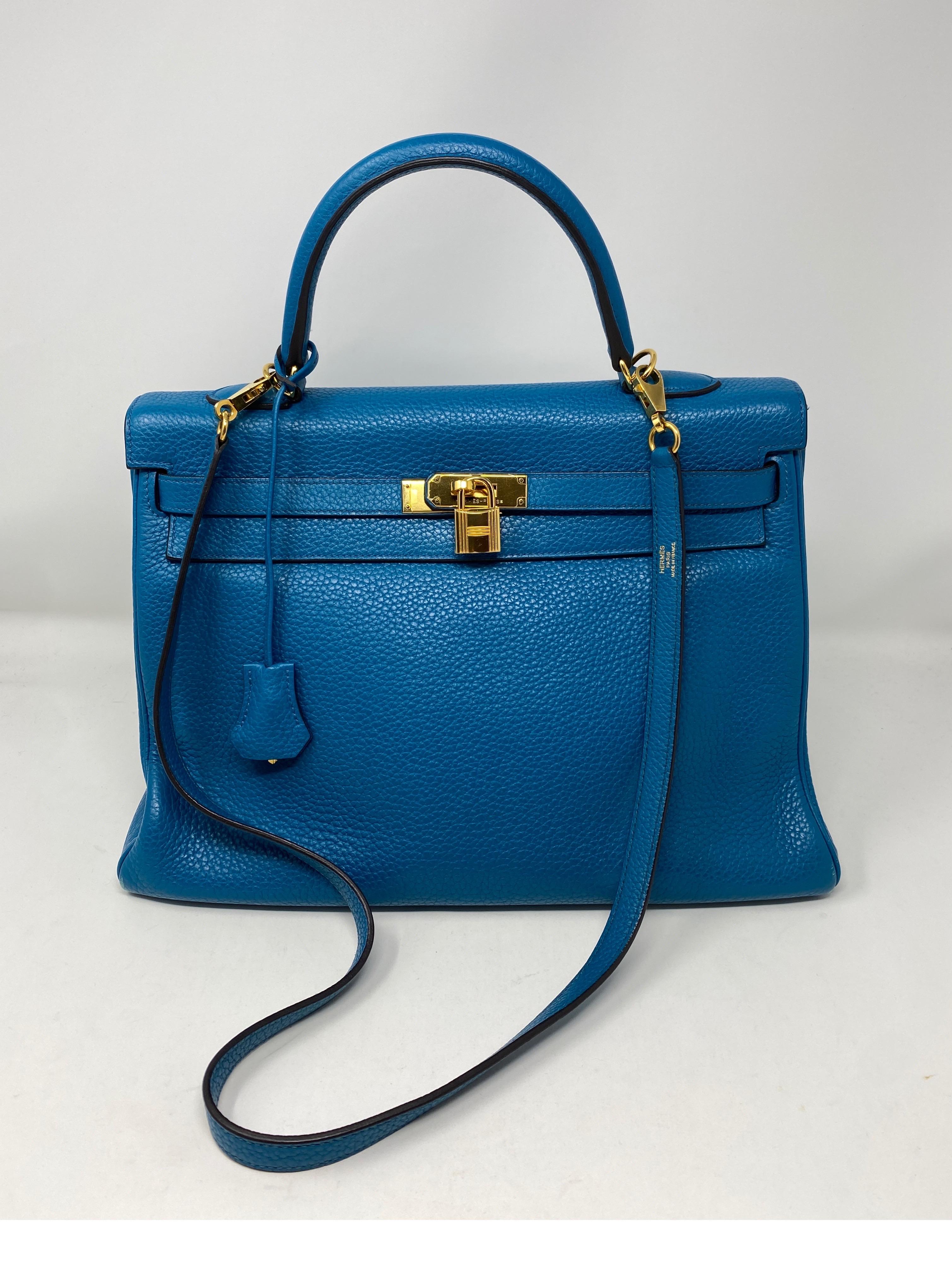 Hermes Blue Izmir Kelly 35 Bag. Gold hardware. Stunning vibrant blue color. Most wanted combo. From 2013 with original receipt. Light wear on corners. Bag is in good condition. Includes clochette, lock, keys and dust cover. Guaranteed authentic. 