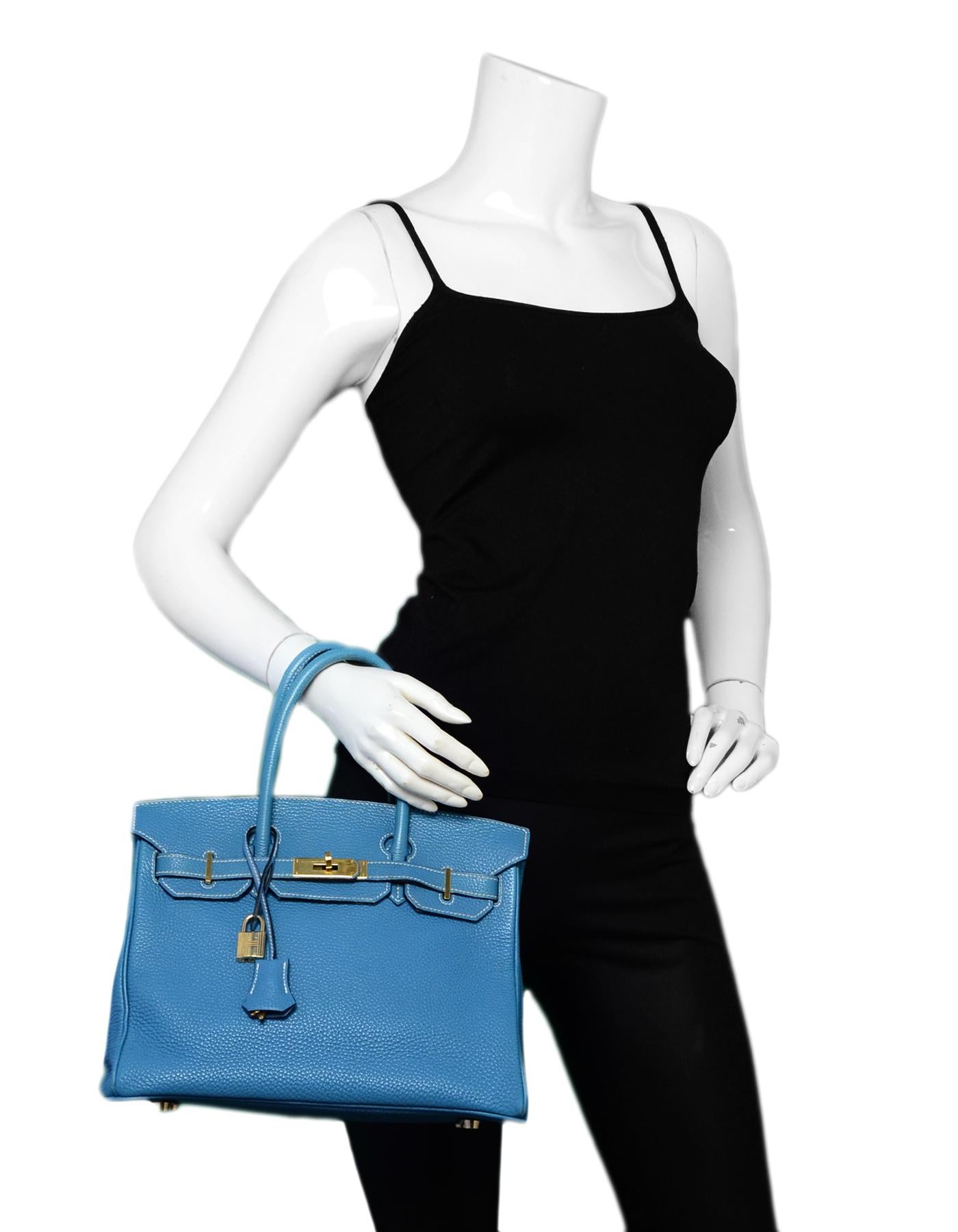 Hermes Blue Jean 30cm Birkin Bag

Made In: France
Year of Production: 2004
Color: Blue jean
Hardware: Goldtone hardware
Materials: Togo leather
Lining: Blue chevre leather
Closure/Opening: Leather draw strap closure with rotating clasp
Exterior
