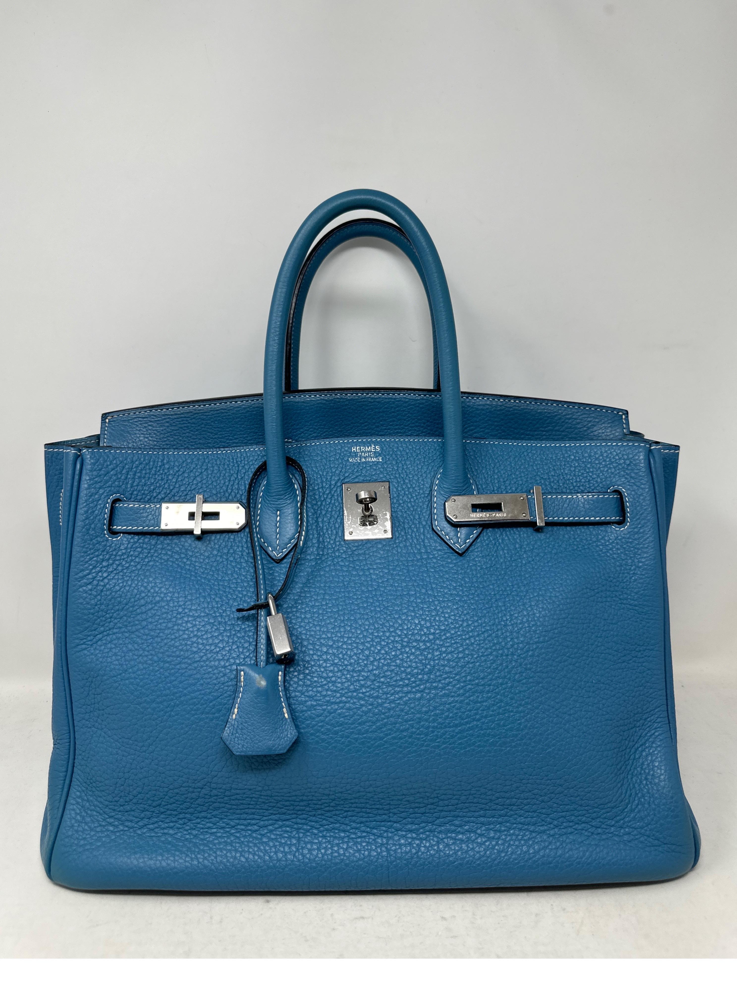 Hermes Blue Jean Birkin 35 Bag. Collector's piece. Sought after color Blue jean. Palladium silver hardware. Good condition. Light wear on corners. Please see photos. Minimal wear. Interior clean. Includes clcohette, lock, keys, and dust bag.