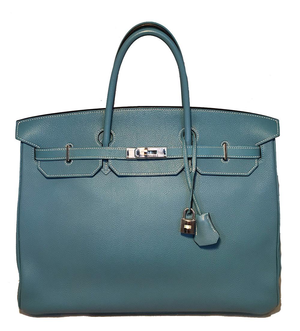 Hermes Blue Jean Togo Leather 40cm Birkin Bag in excellent condition. Blue jean togo leather exterior trimmed with silver palladium hardware. Front signature double strap twist front closure opens to a matching blue kidskin lined interior that holds