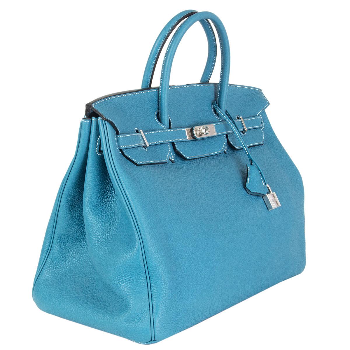 Hermès 'Birkin 40' bag in Blue Jean (light blue) Veau Togo leather with contrasting white stitching and palladium hardware. Lined in Chevre (goat skin) with an open pocket against the front and a zipper pocket against the back. Brand new. Comes with