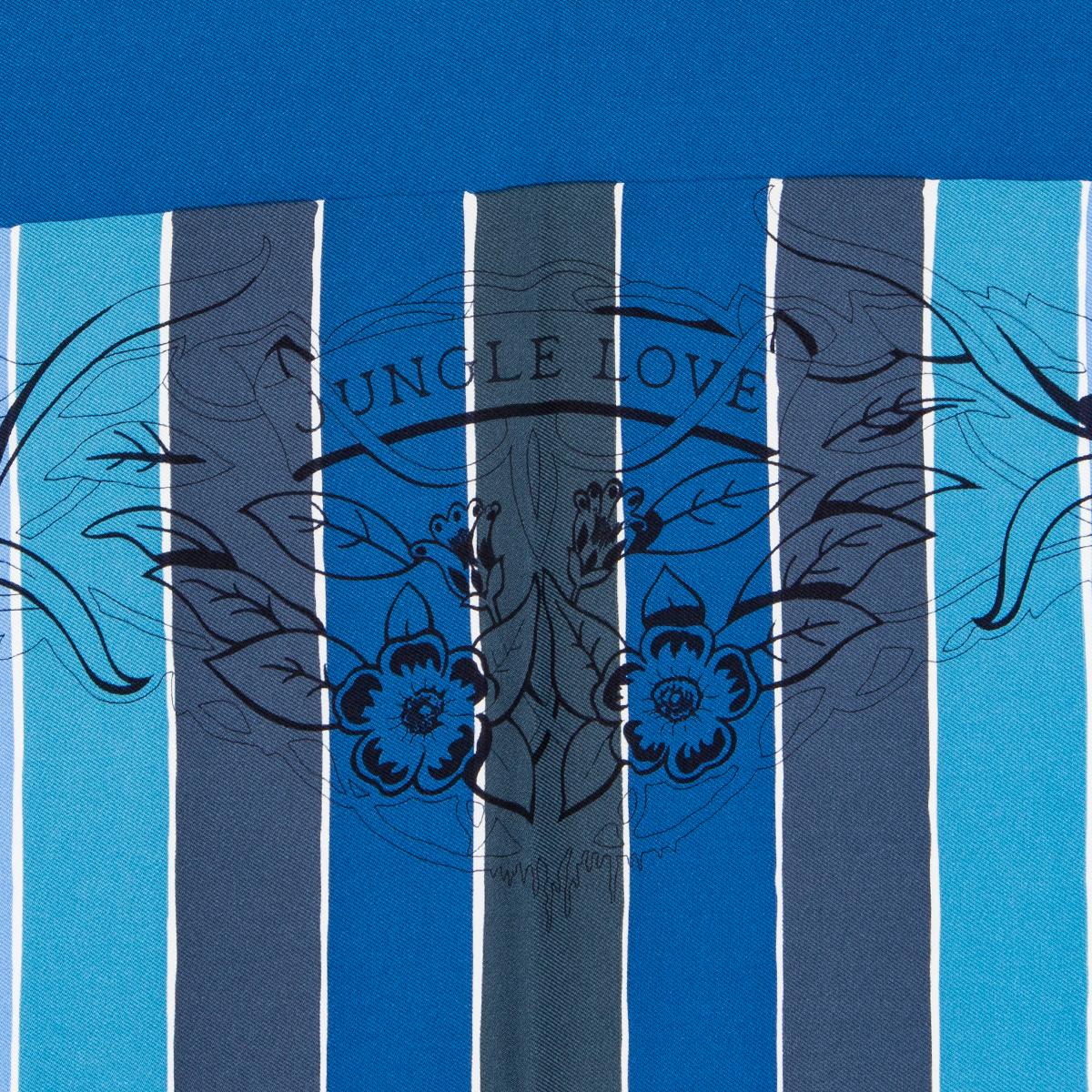 Hermes 'Jungles Love Rainbow 90' scarf by Robert Dallet in blue silk twill (100%) with contrasting light blue hem and details in every shade of blue and black. Brand new with tag.

Width 90cm (35.1in)
Height 90cm (35.1in)