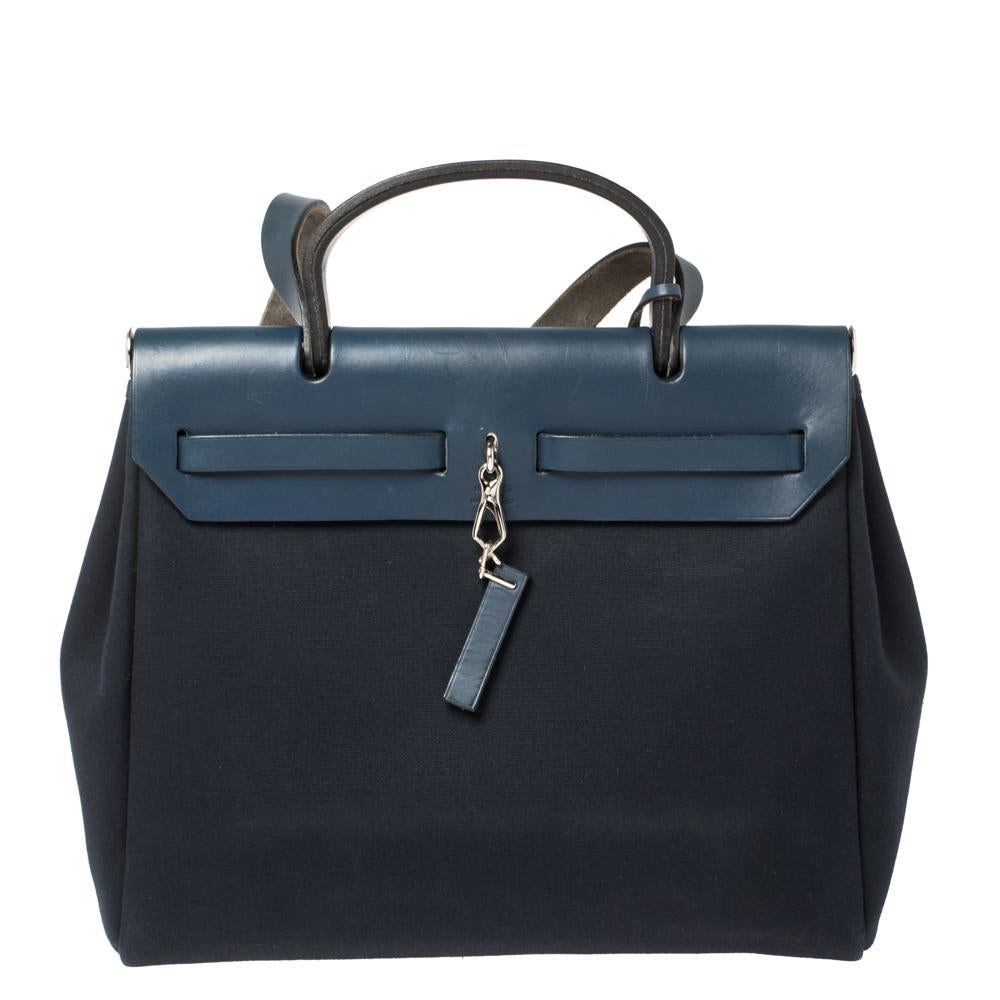 Made from canvas and leather, the Herbag Zip is just as outstanding as all of Hermes' other handbags. First introduced in 2009 as a new version of the Herbag, this piece comes with a single handle, a long shoulder strap and it flaunts fabulous