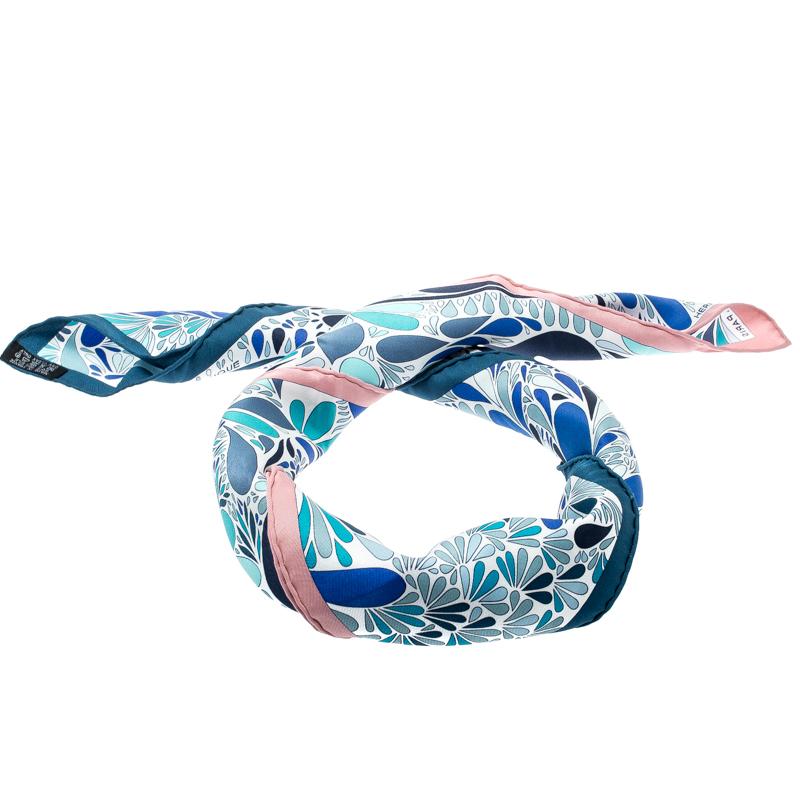 This Herme scarf is beautifully adorned in varied shades of blue featuring an interesting print all over. It is cut from silk and has neatly stitched edges. This one is a fabulous accessory to style your dresses and separates.

Includes: The Luxury
