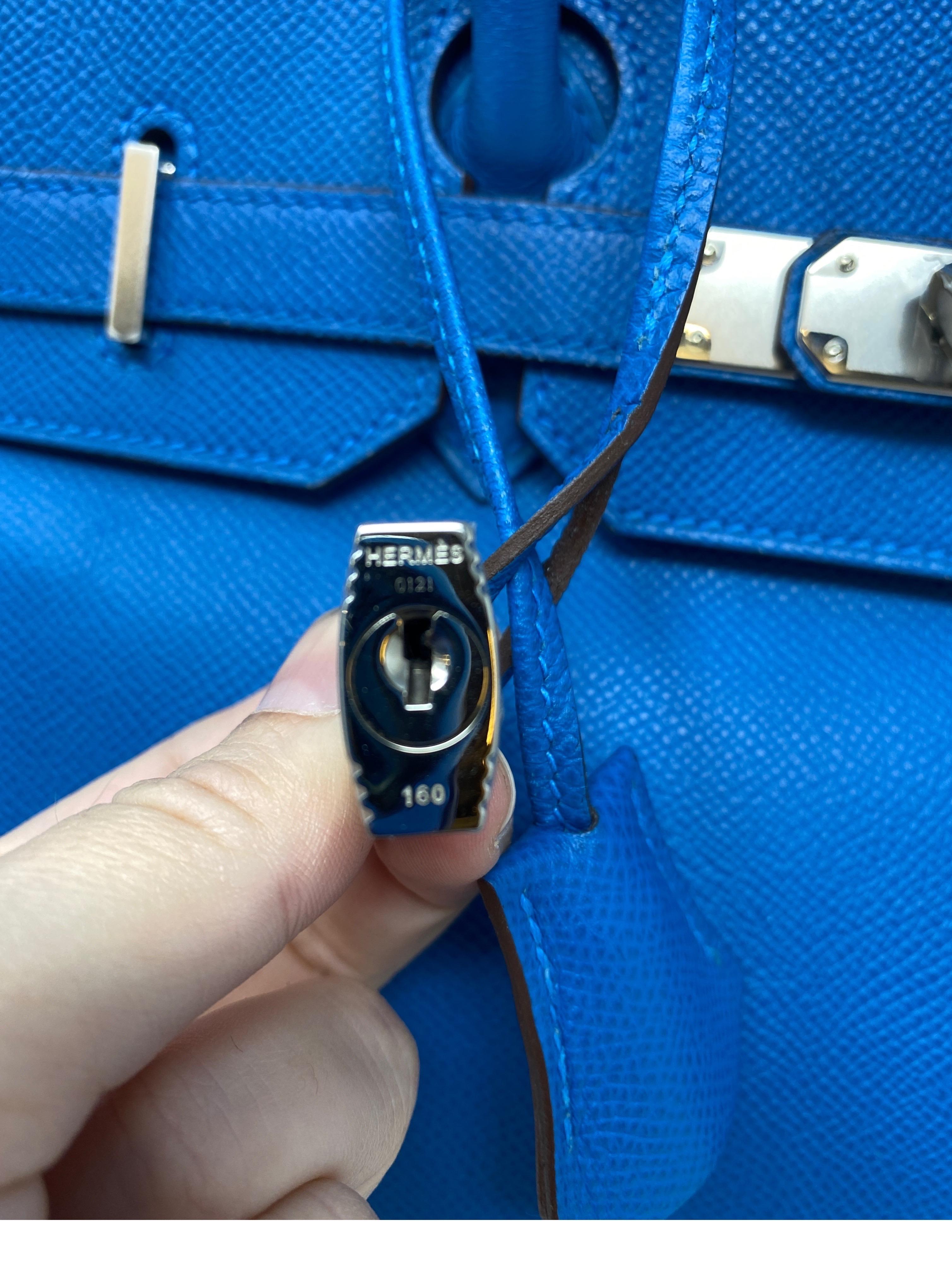 Hermes Blue Mykonos Birkin 35 Bag. Palladium hardware. Excellent condition. Looks like new. Gift ready. Beautiful vibrant blue color. Rare color. Desirable epsom leather. Includes clochette, lock, keys, and dust cover. Guaranteed authentic. 