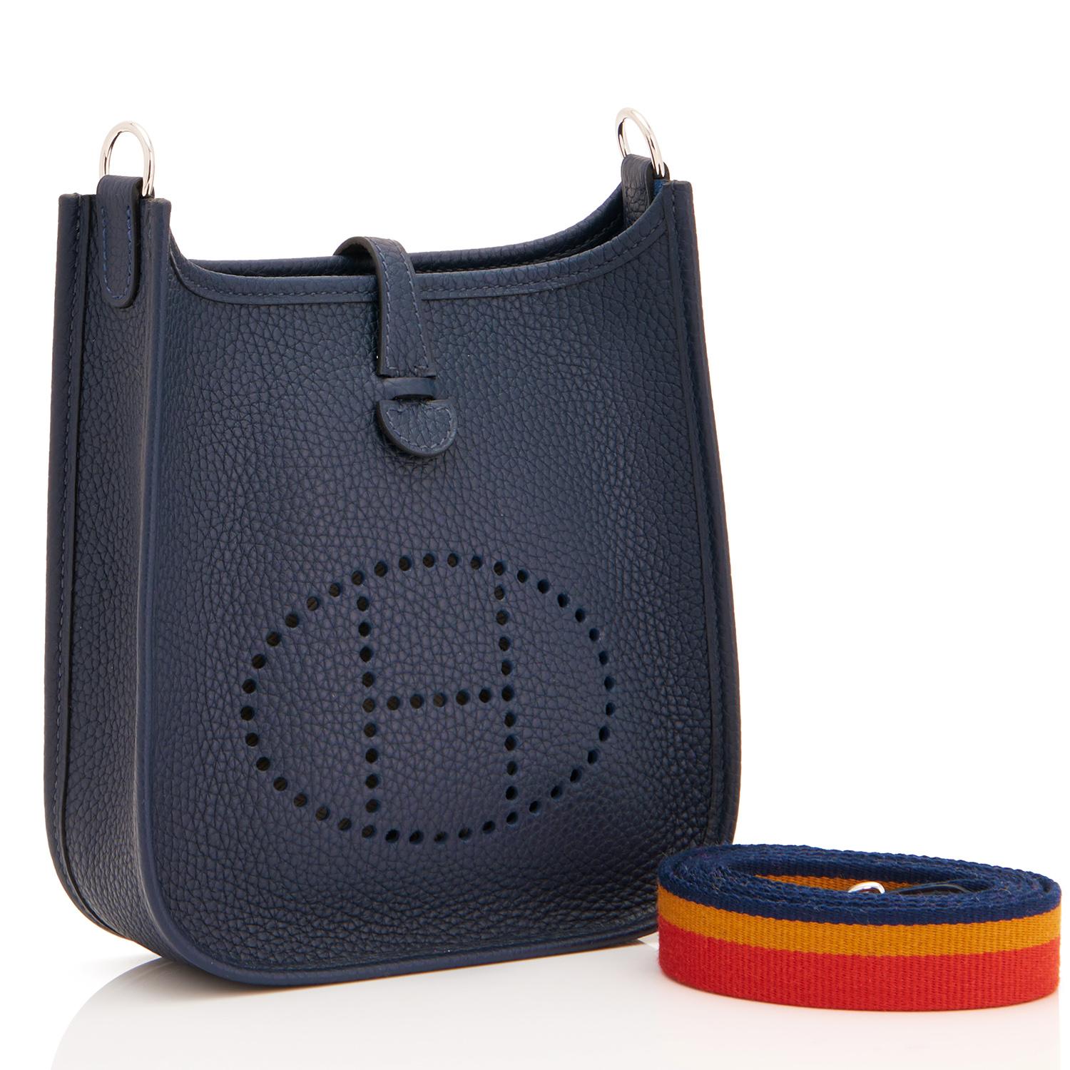 Hermes Blue Nuit Navy Evelyne TPM Clemence Shoulder Cross Body Messenger Bag
Brand New in Box. Store Fresh. Pristine Condition.
Perfect gift! Coming in full set with shoulder strap, Hermes sleepers, and Hermes box. 
This Blue Nuit Evelyne Tres