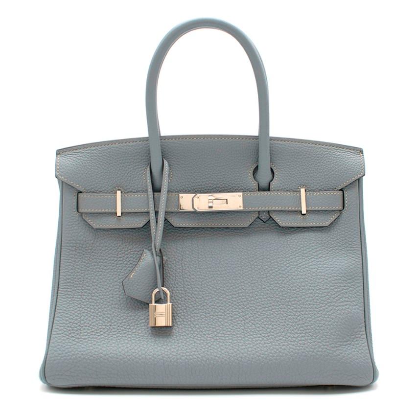 Hermes Blue Orage Togo Leather 30cm Birkin

Made in France
Age - [Q] 2013
Features two rolled leather handles.
Includes a front flap closure using swivel clasp and a silver - and palladium-plated fastening.
Includes clochette and keys, dust bag, box