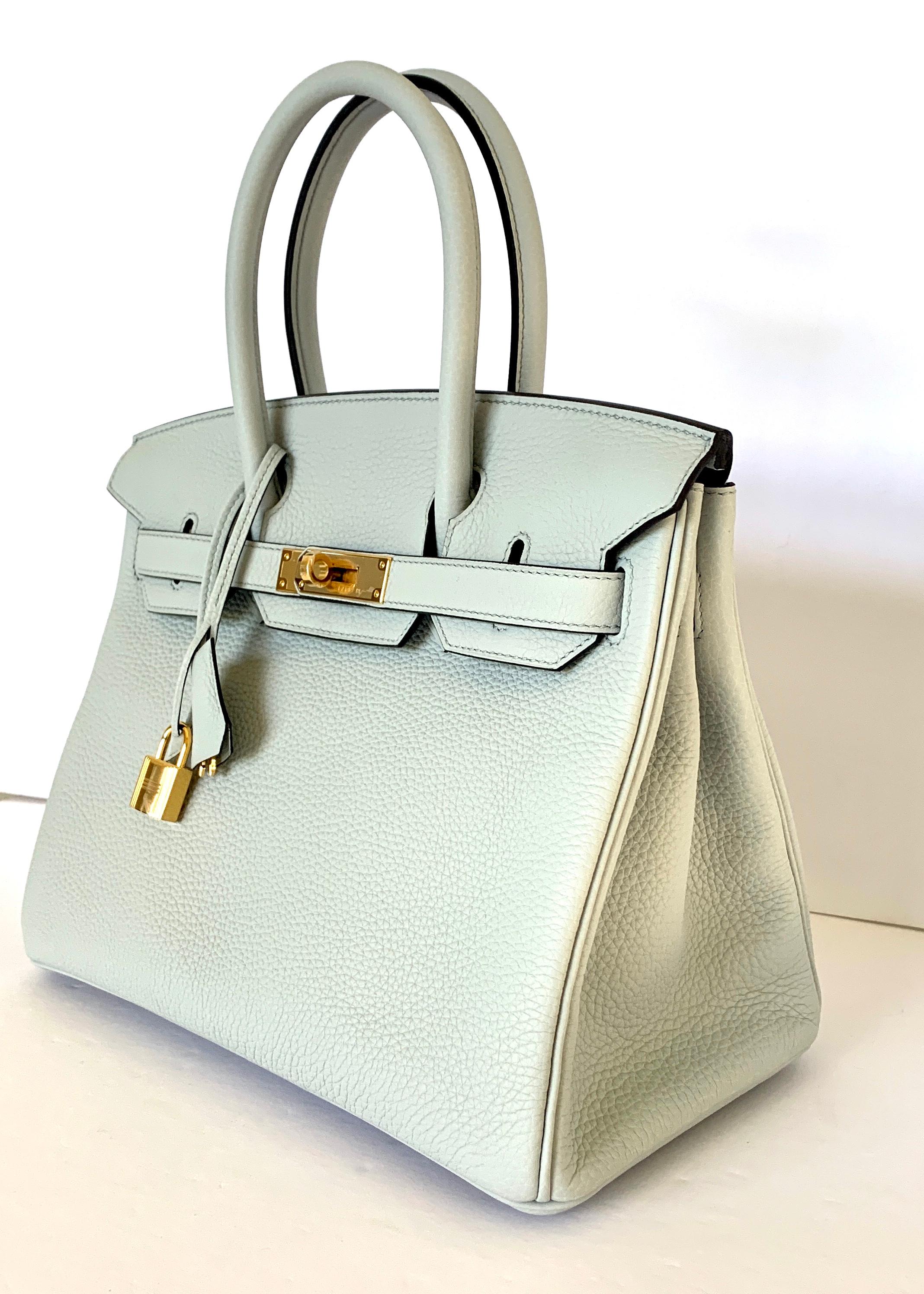 Hermès Birkin 30cm
New Color Blue Pale
Taurillon Clemence Leather
Gold Hardware
Stunning new Birkin
Tonal stitiching
Two straps with front toggle closure, clochette with lock and two keys and double rolled handles.
Approx measurements: 11.75