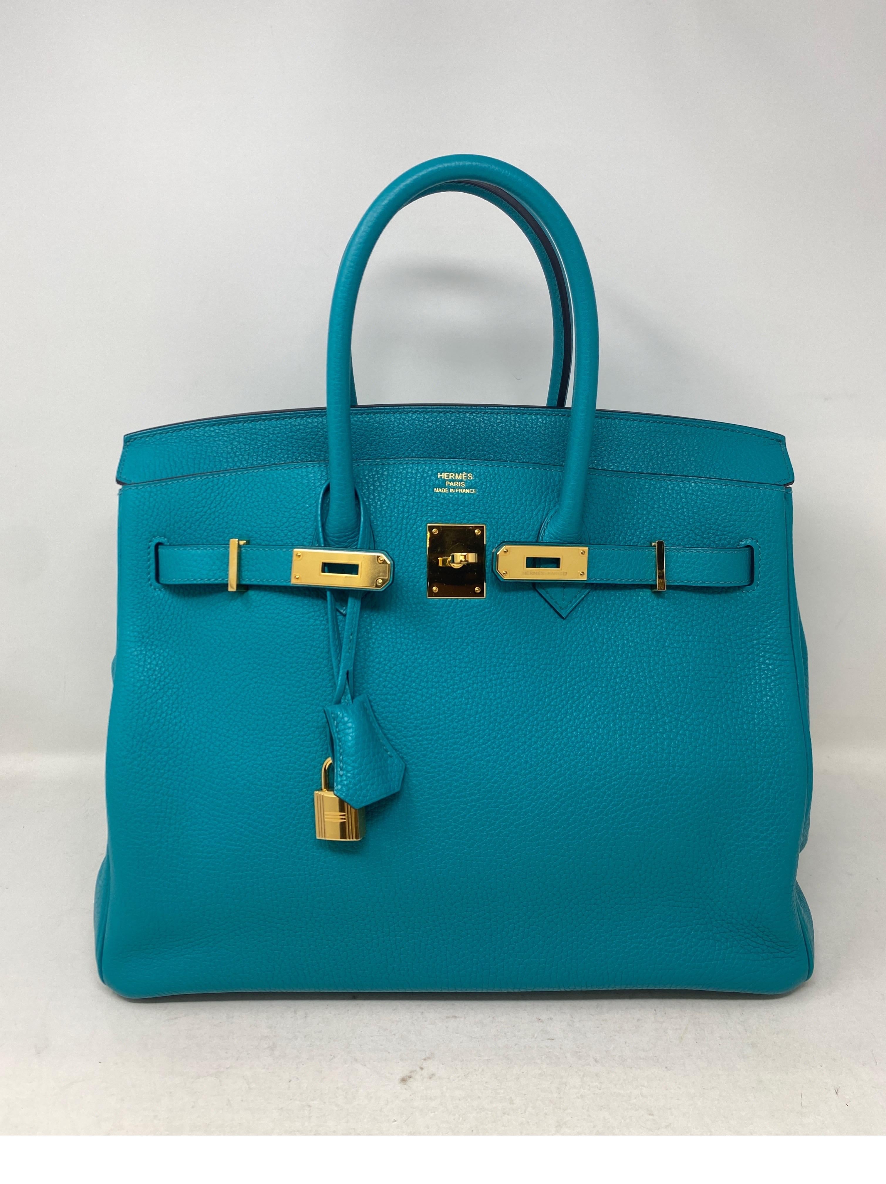 Hermes Blue Paon Birkin 35 Bag. Excellent like new condition. Like brand new. Beautiful teal blue color with gold hardware. Includes clochette, lock, keys, and dust cover. Guaranteed authentic. 