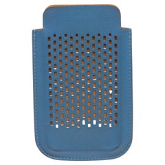 Hermes blue perforated leather iPhone 4 case with brown leather lining. 15014MSC