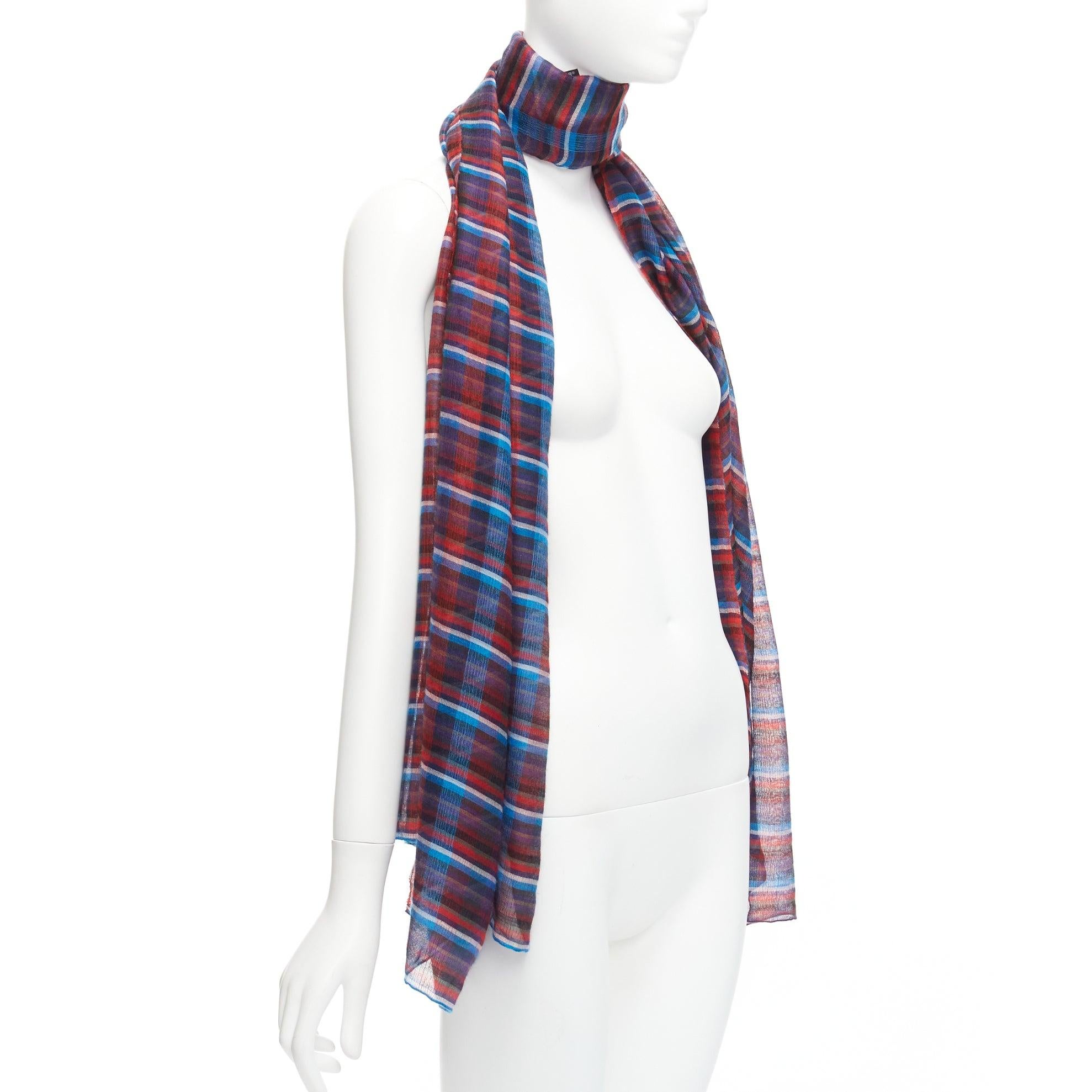HERMES blue red checkered cashmere silk long wrap rectangular scarf
Reference: AAWC/A00836
Brand: Hermes
Material: Cashmere, Silk
Color: Blue, Red
Pattern: Checkered
Made in: Nepal

CONDITION:
Condition: Excellent, this item was pre-owned and is in