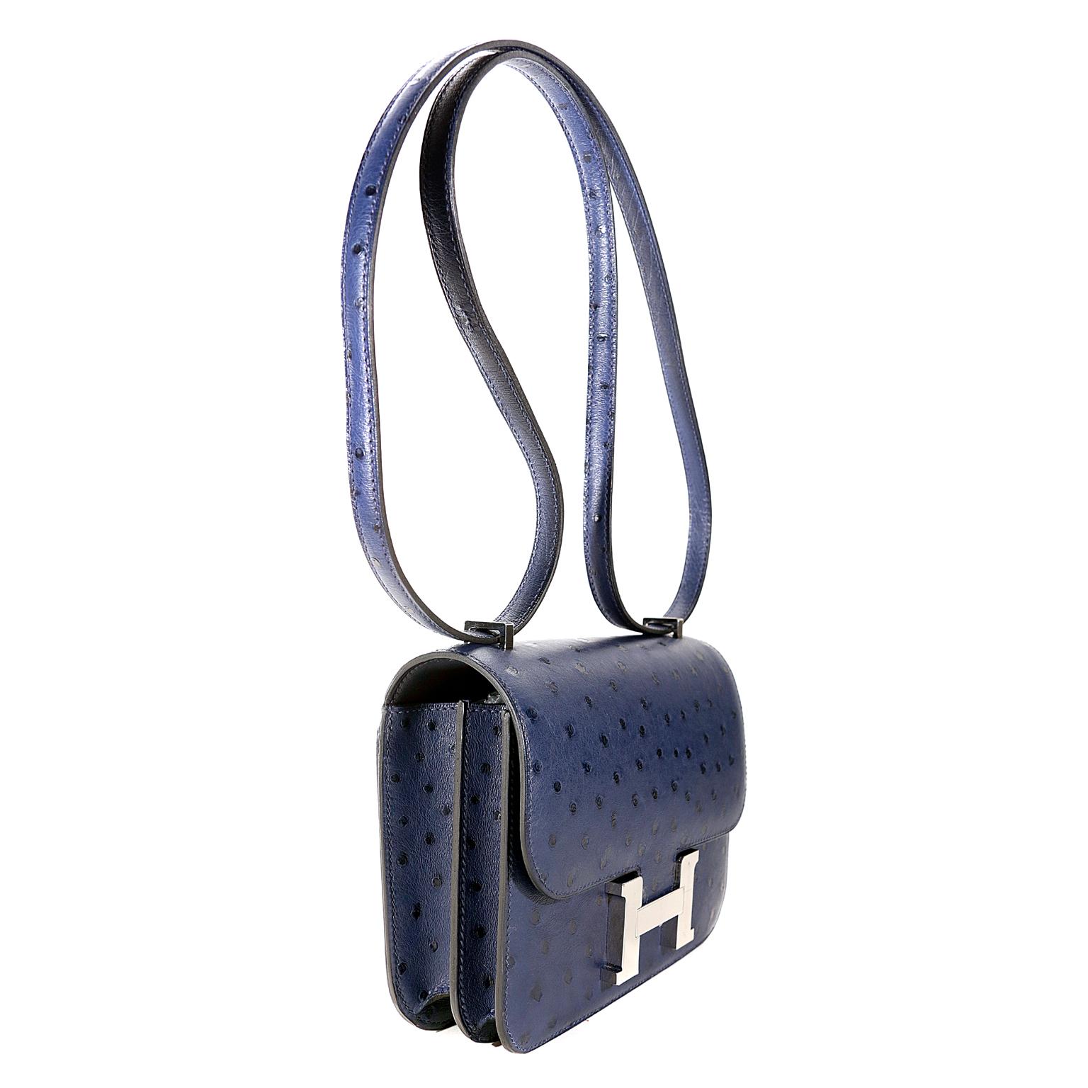 Hermès Blue Roi Ostrich Constance Mini 18 -PRISTINE  Unworn Condition
One of Jackie O’s favorite Hermès styles, she was often photographed wearing one of the many in her collection. This exotic ostrich version is extremely rare; a special piece for