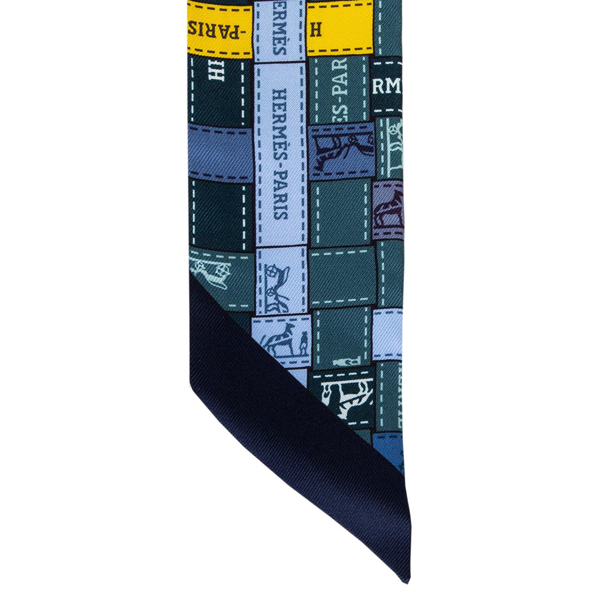 Hernes 'Bolduc au Carre Twilly' scarf in petrol blue silk twil (100%) with details in teal, periwinkle and dark blue. Brand new with tag.

Width 5cm (2in)
Length 86cm (33.5in)
