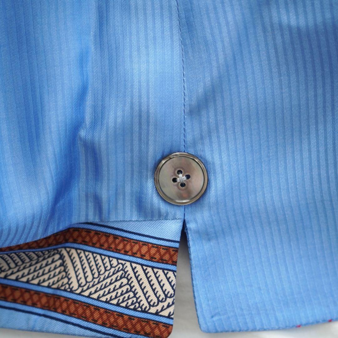 Chaleco abotonado de seda azul Hermès en venta 4