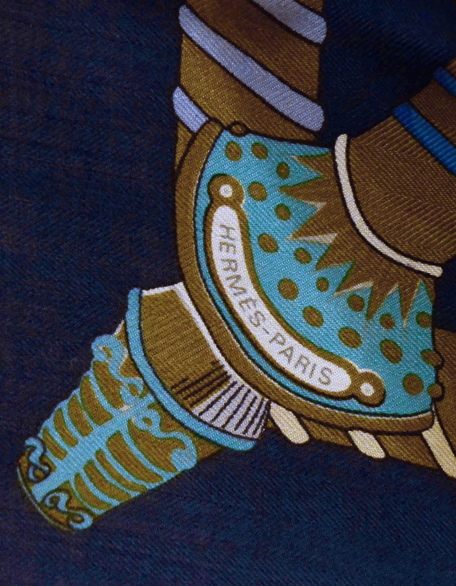 Hermes “Etendards et Bannieres” by Annie Faivre 140cm Shawl/Scarf

Made In: France
Designed By: Annie Faivre
Color: Navy Blue & Aqua
Materials: 65% Cashmere, 35% Silk
Overall Condition: Very good 3 faint pulls approx 3” long
Estimated Retail: